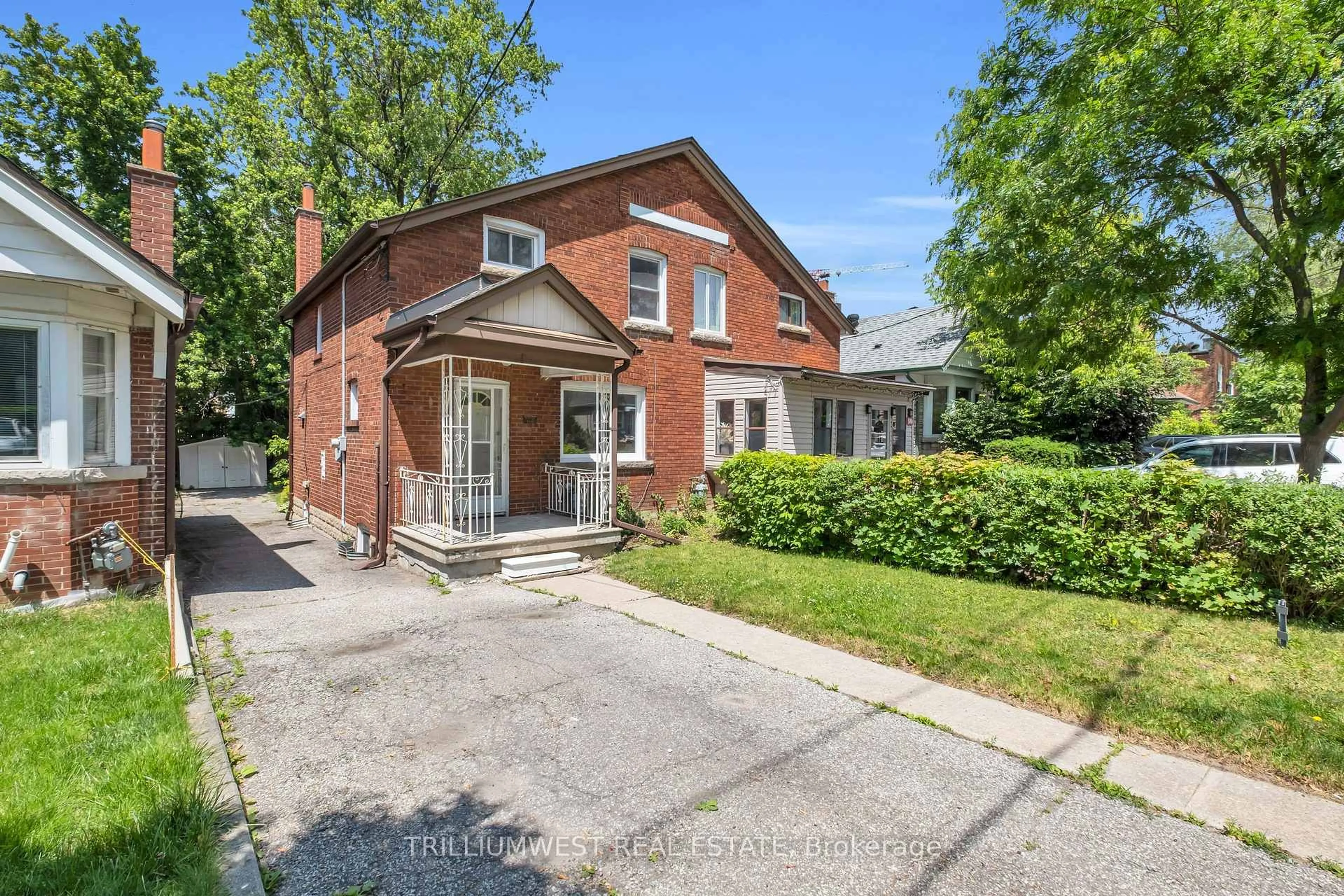 Home with brick exterior material, street for 308 WHITMORE Ave, Toronto Ontario M6E 2N4