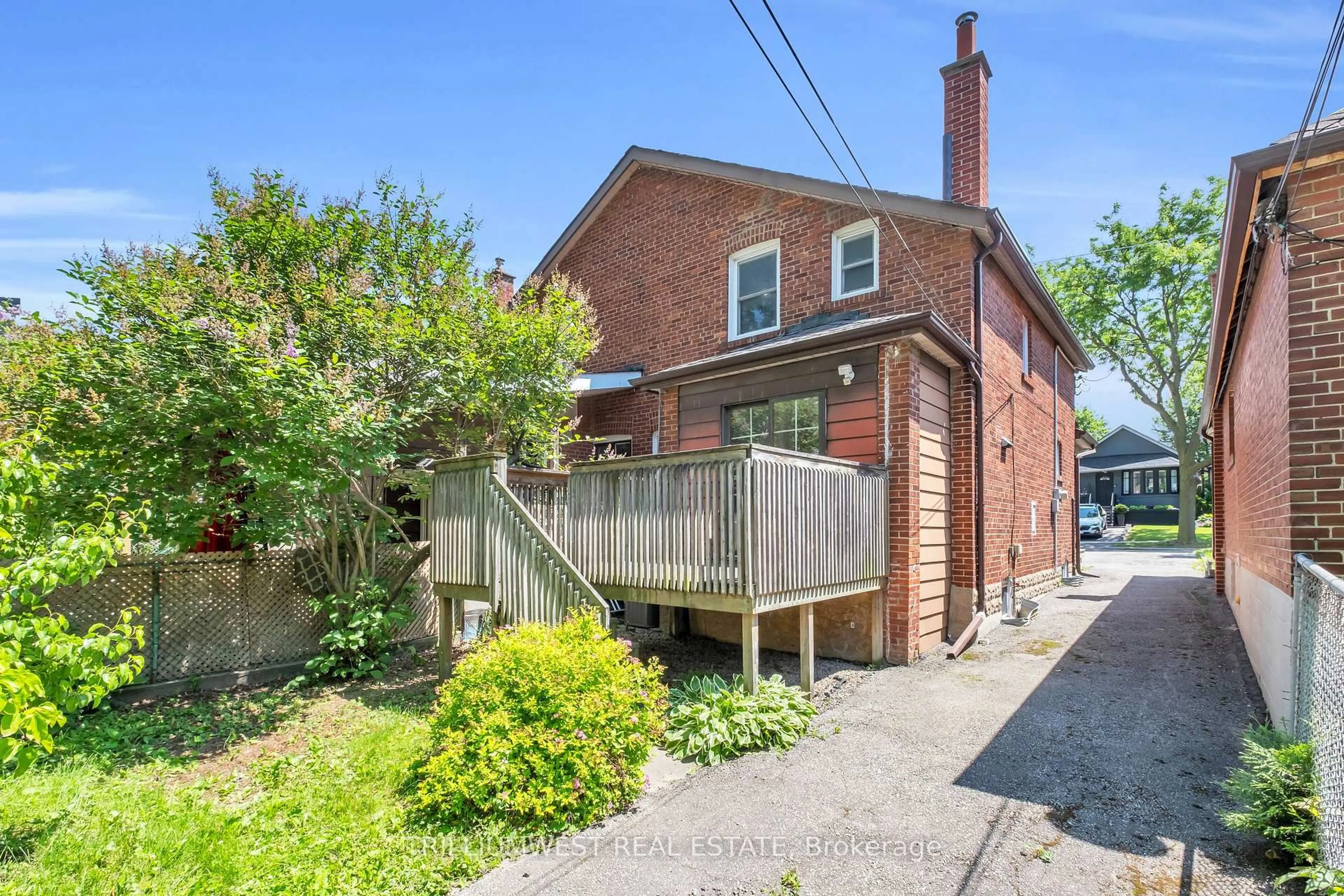 Home with brick exterior material, street for 308 WHITMORE Ave, Toronto Ontario M6E 2N4