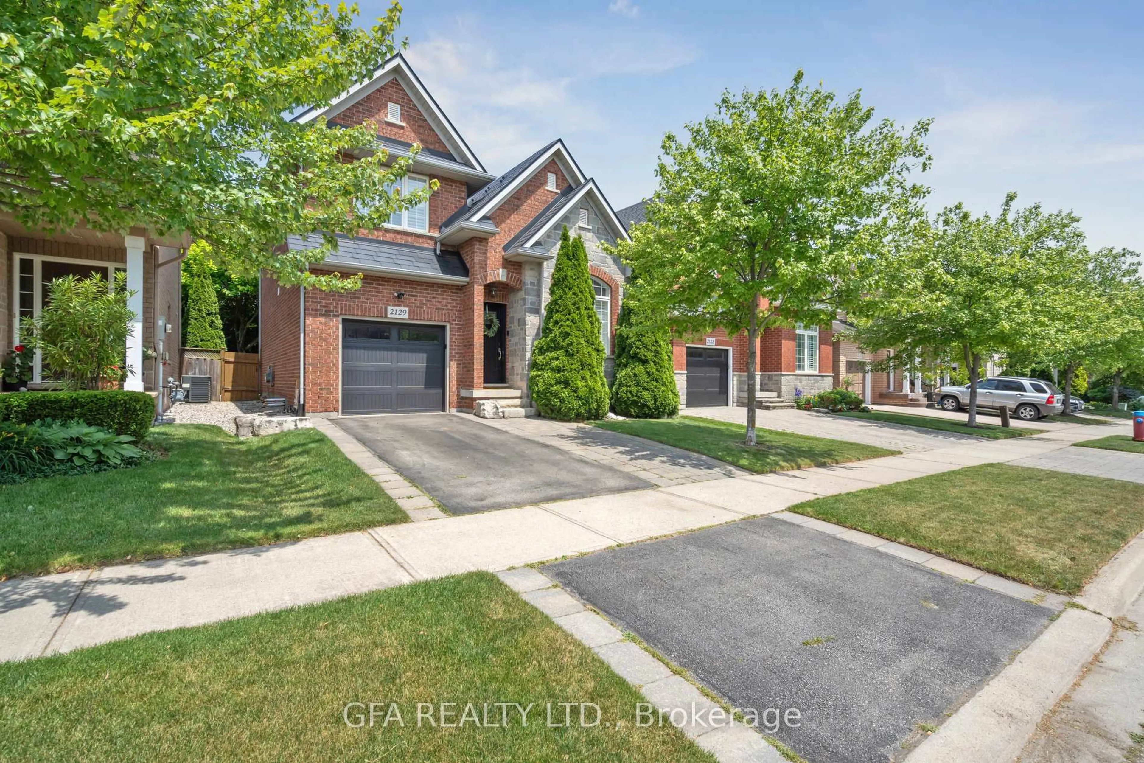 Home with brick exterior material, street for 2129 Brookhaven Cres, Oakville Ontario L6M 5B8