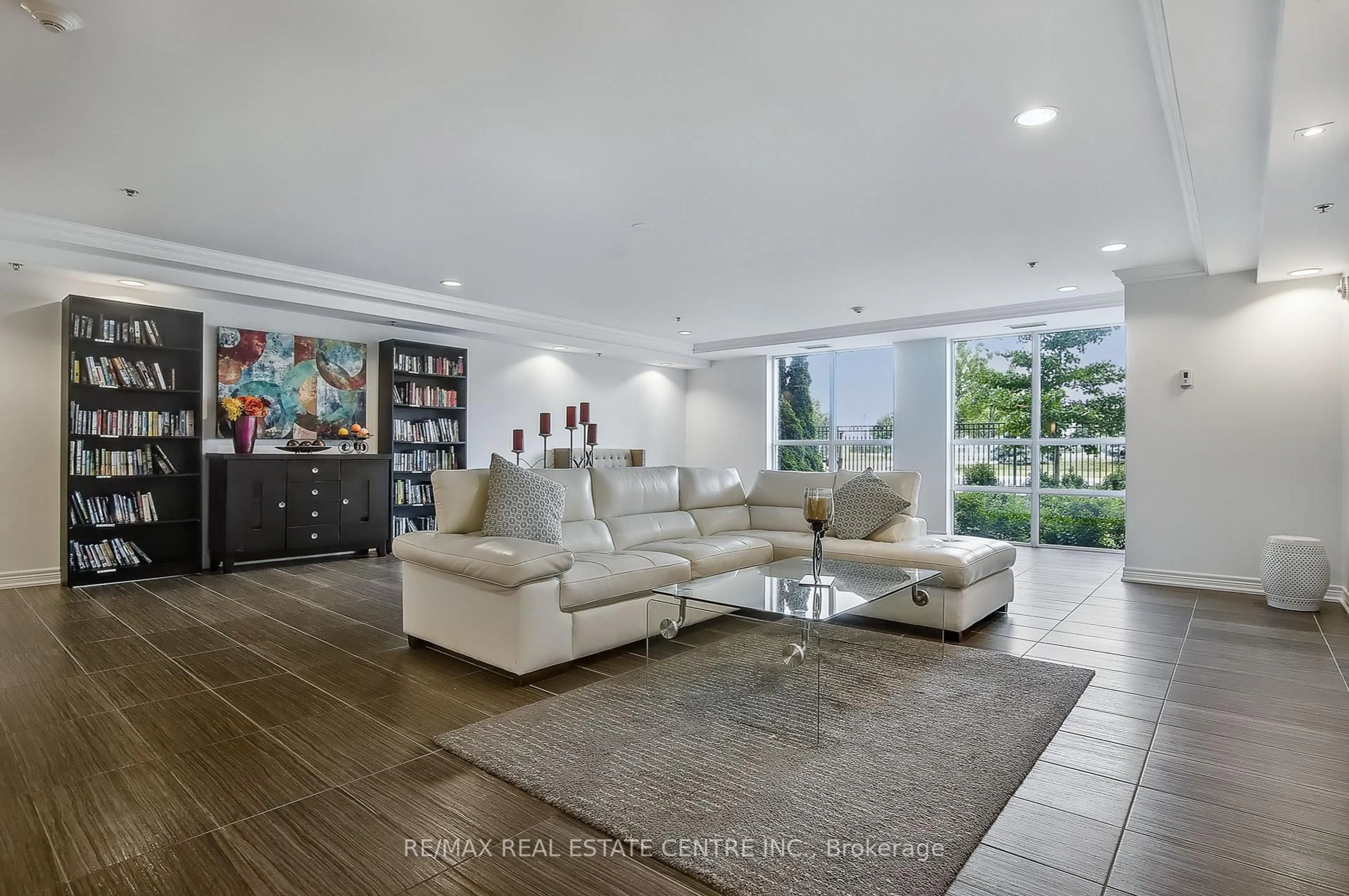 Living room with furniture, ceramic/tile floor for 1421 Costigan Rd #504, Milton Ontario L9T 2N4