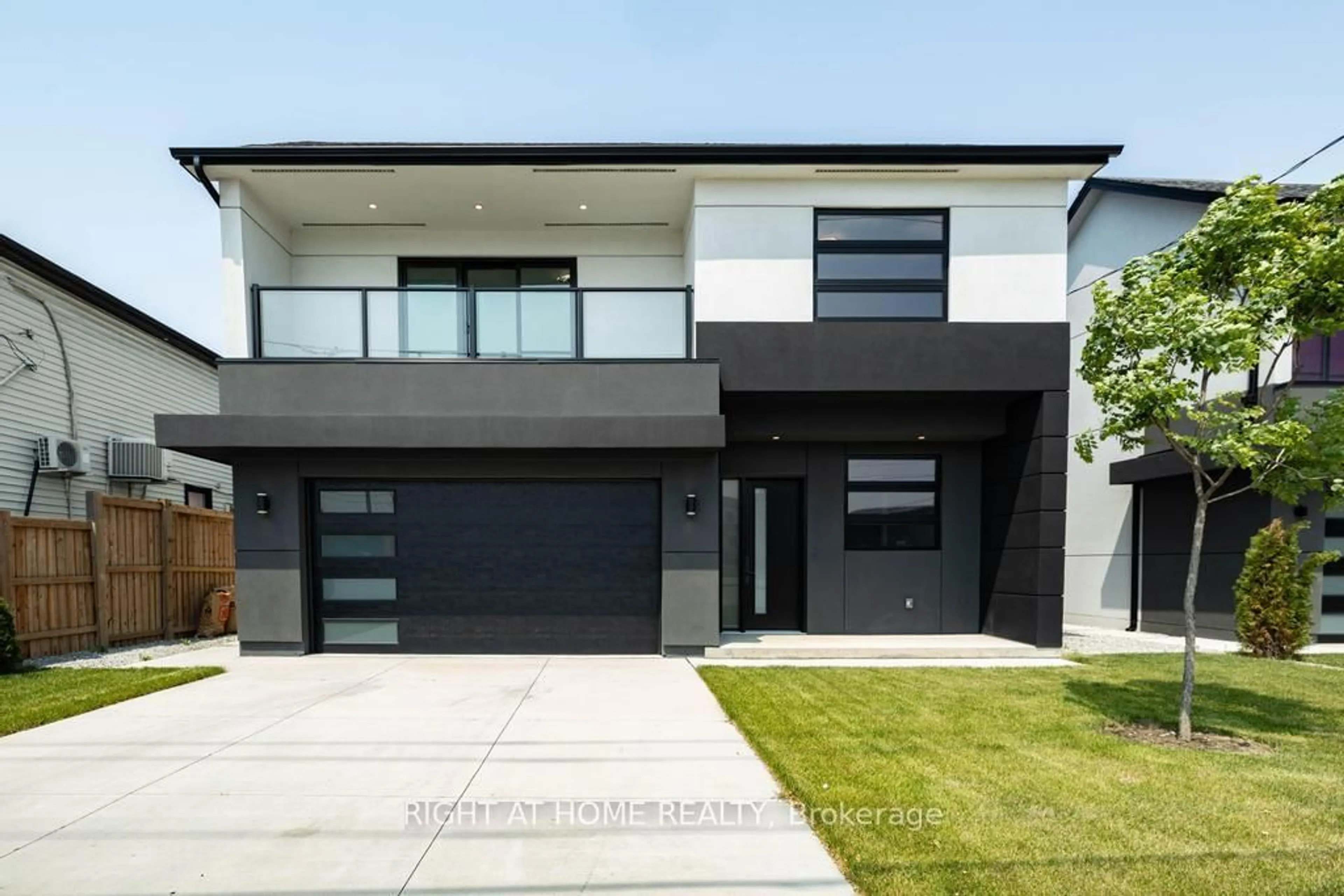 Home with brick exterior material, street for 16 Walsh Ave, Toronto Ontario M9M 1B6