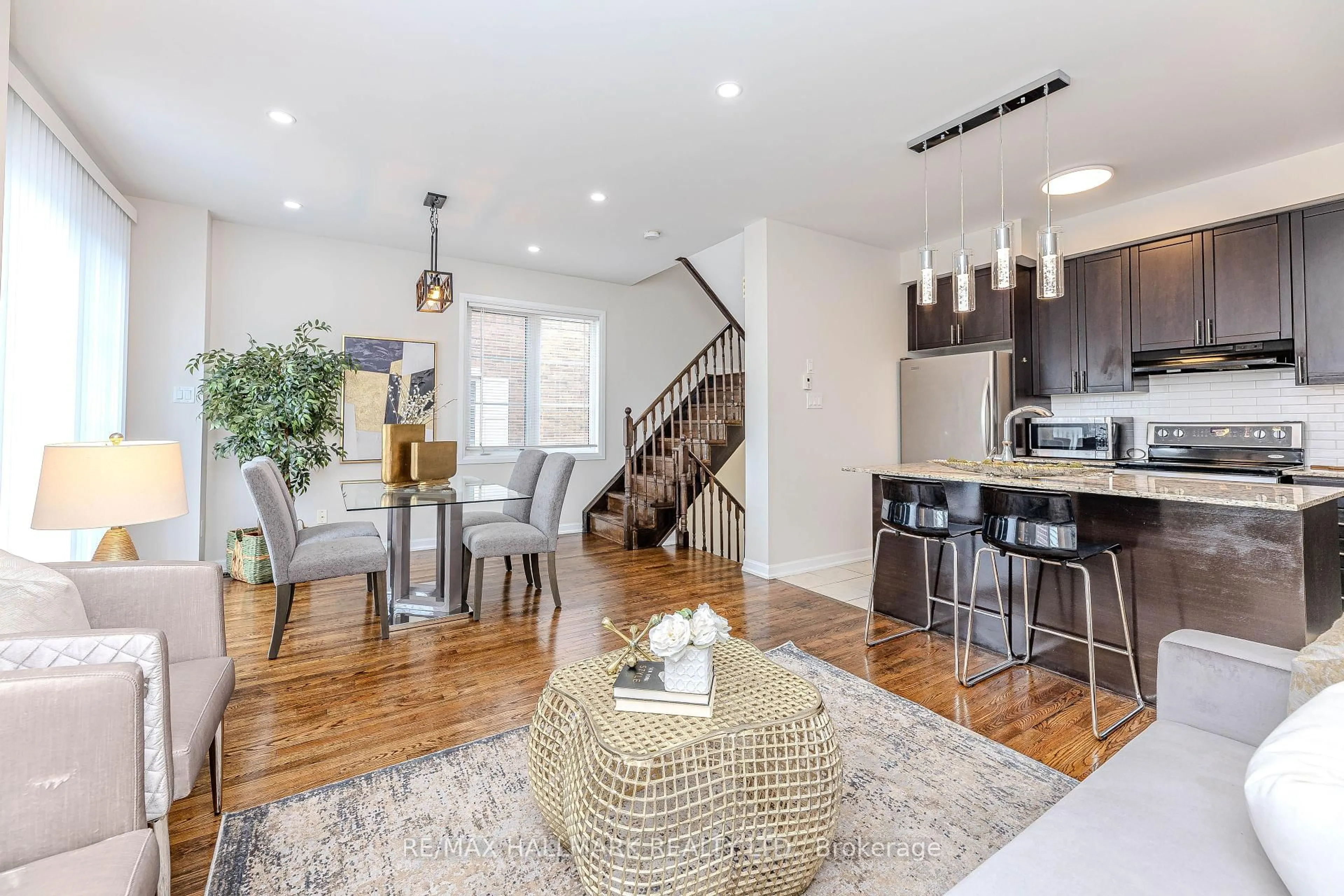 Open concept kitchen, wood/laminate floor for 165 Hampshire Way #146, Milton Ontario L9T 8M7