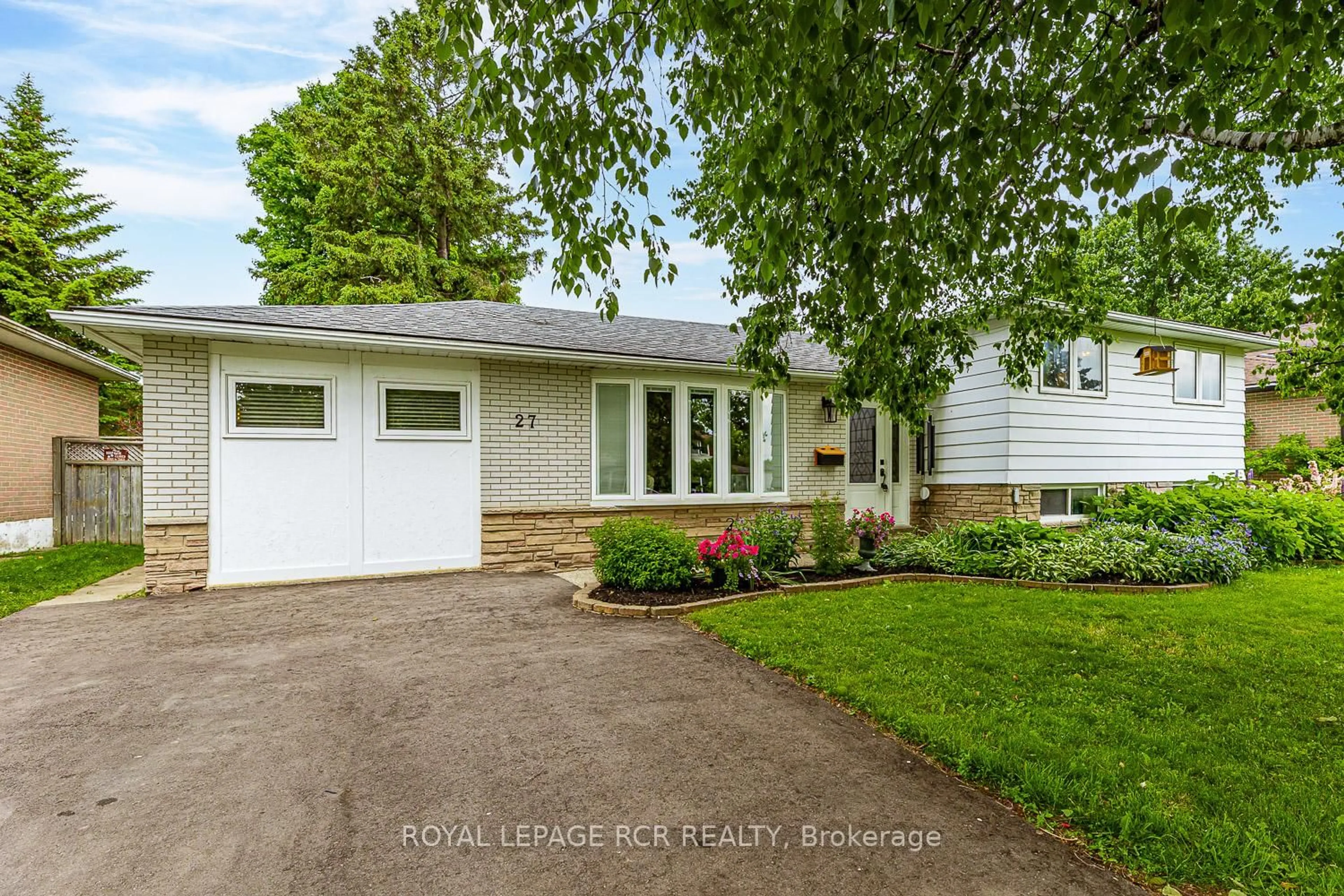 Home with vinyl exterior material, street for 27 Rustic Cres, Orangeville Ontario L9W 1T1