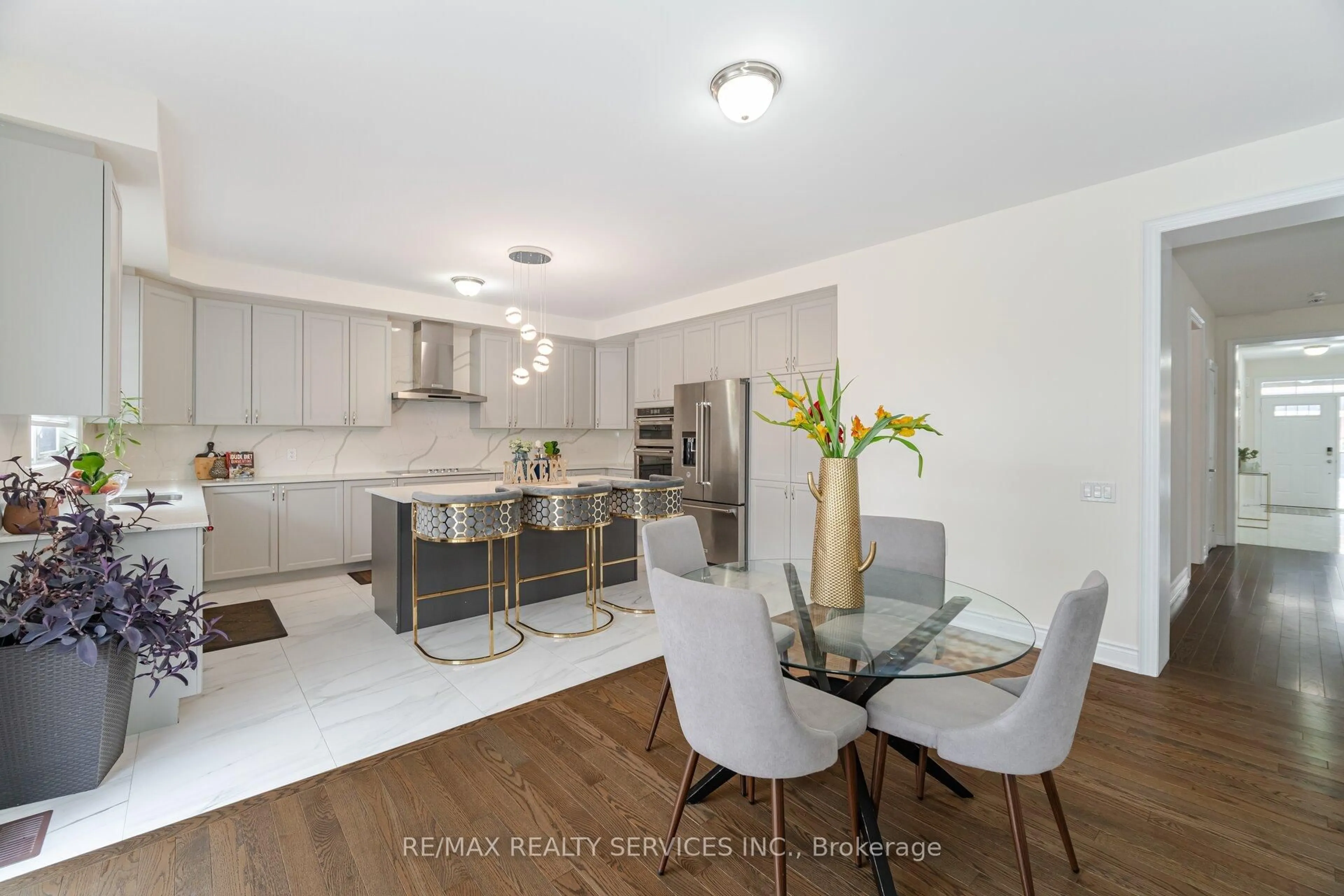 Open concept kitchen, wood/laminate floor for 40 Portman St, Caledon Ontario L7C 4E5