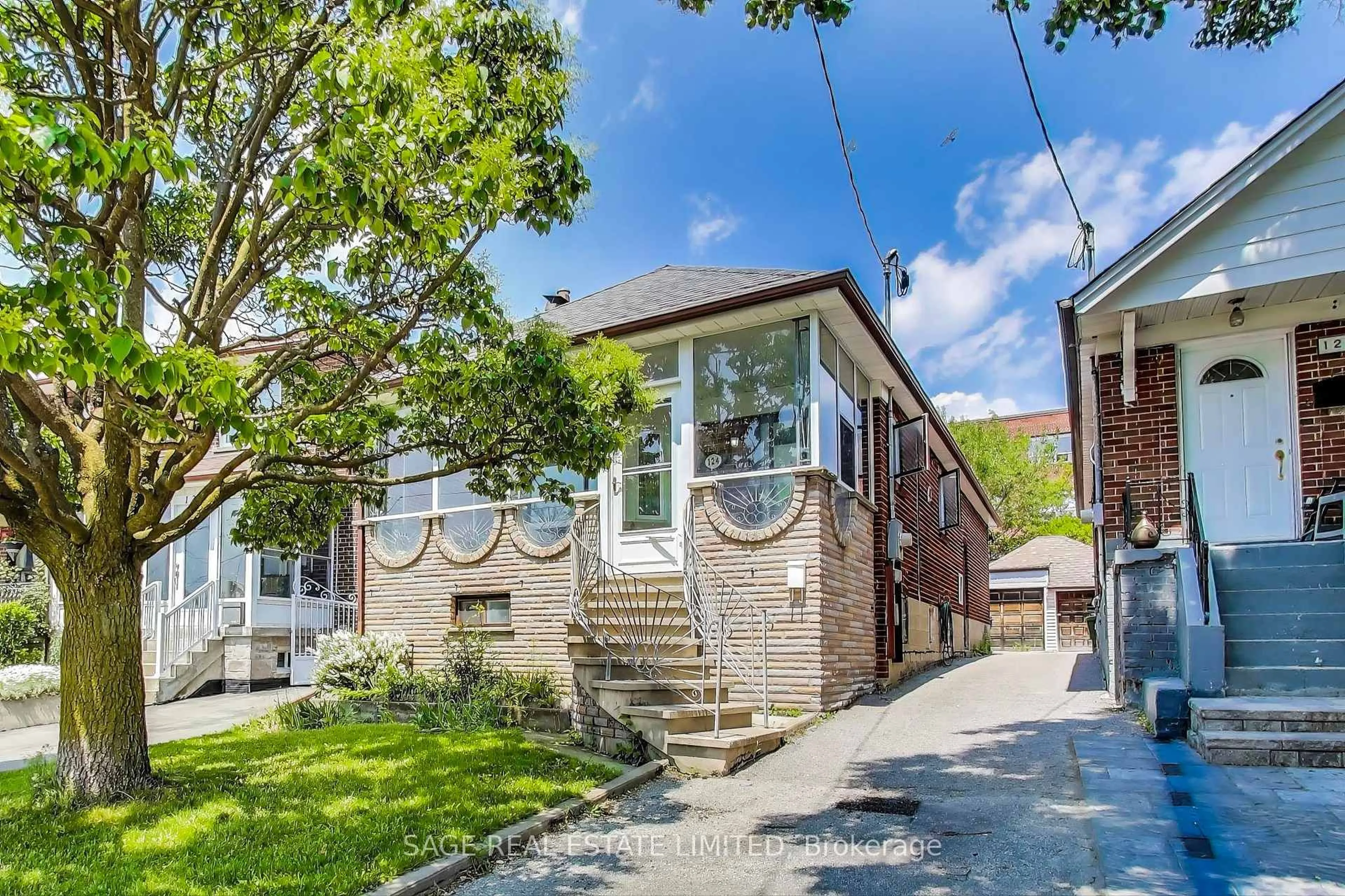 Home with brick exterior material, street for 124 Branstone Rd, Toronto Ontario M6E 4E5