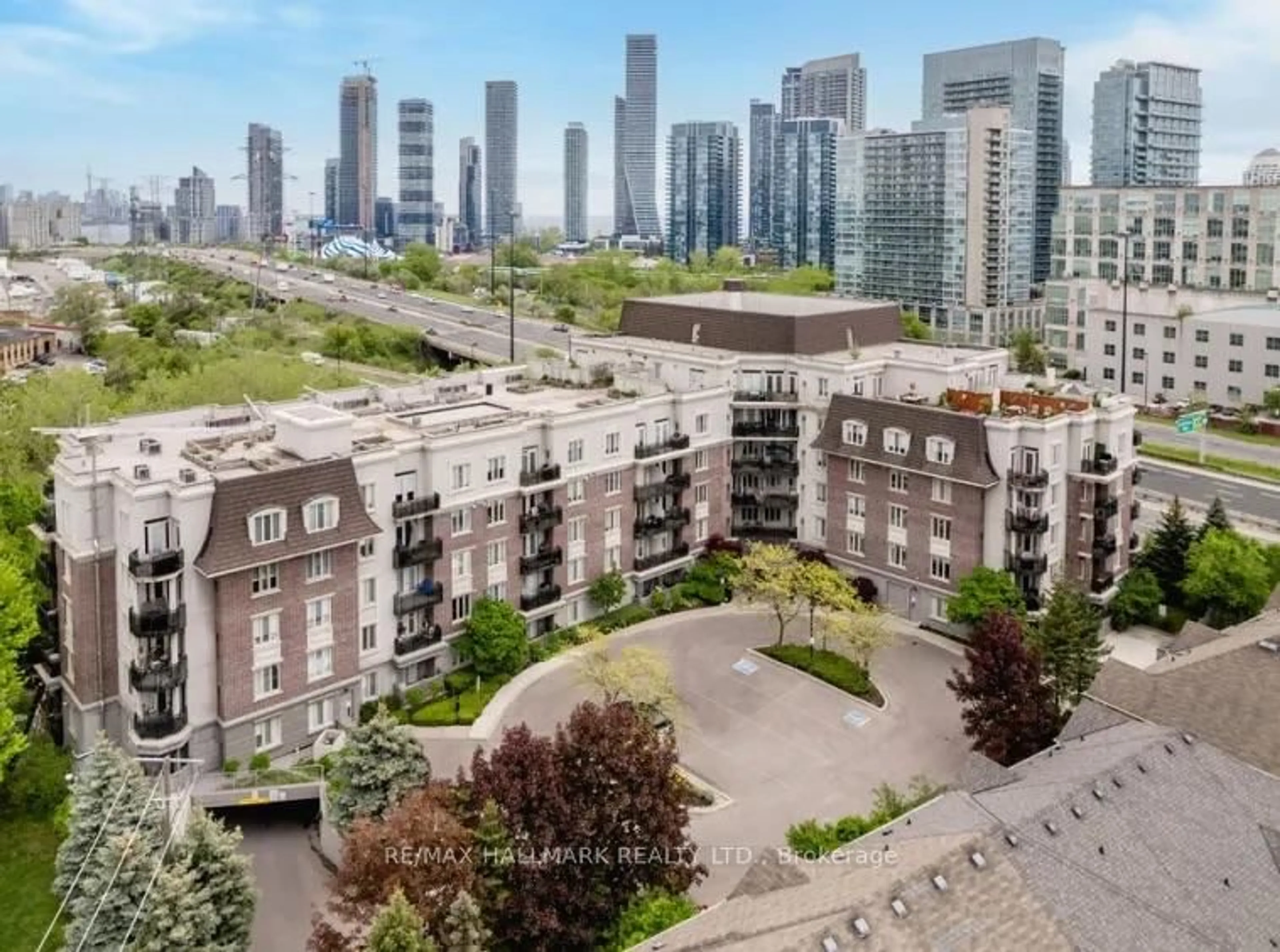 A pic from outside/outdoor area/front of a property/back of a property/a pic from drone, city buildings view from balcony for 245 Dalesford Rd #115, Toronto Ontario M8Y 4H7