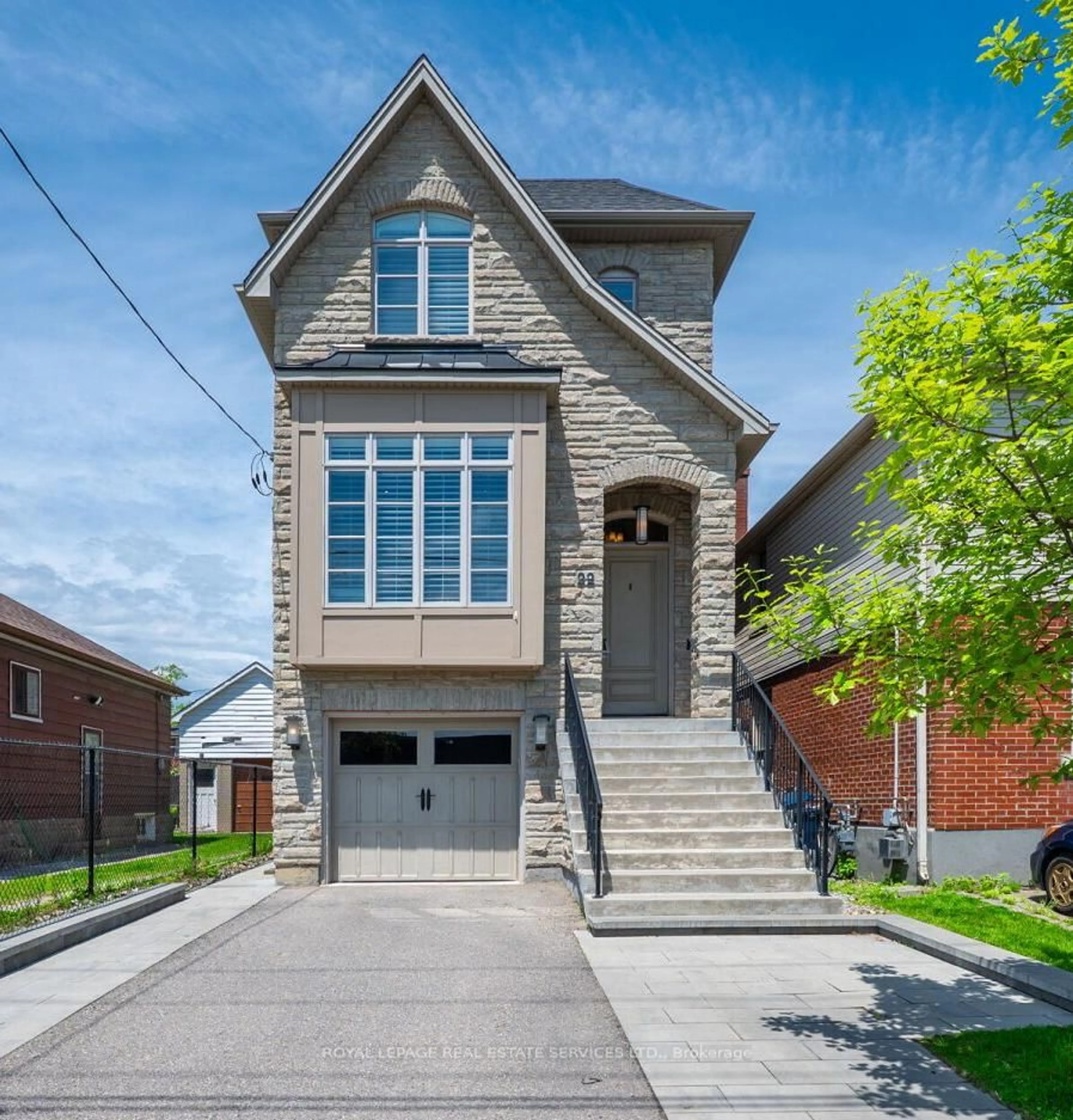 Home with brick exterior material, street for 22 Portland St, Toronto Ontario M8Y 1A5