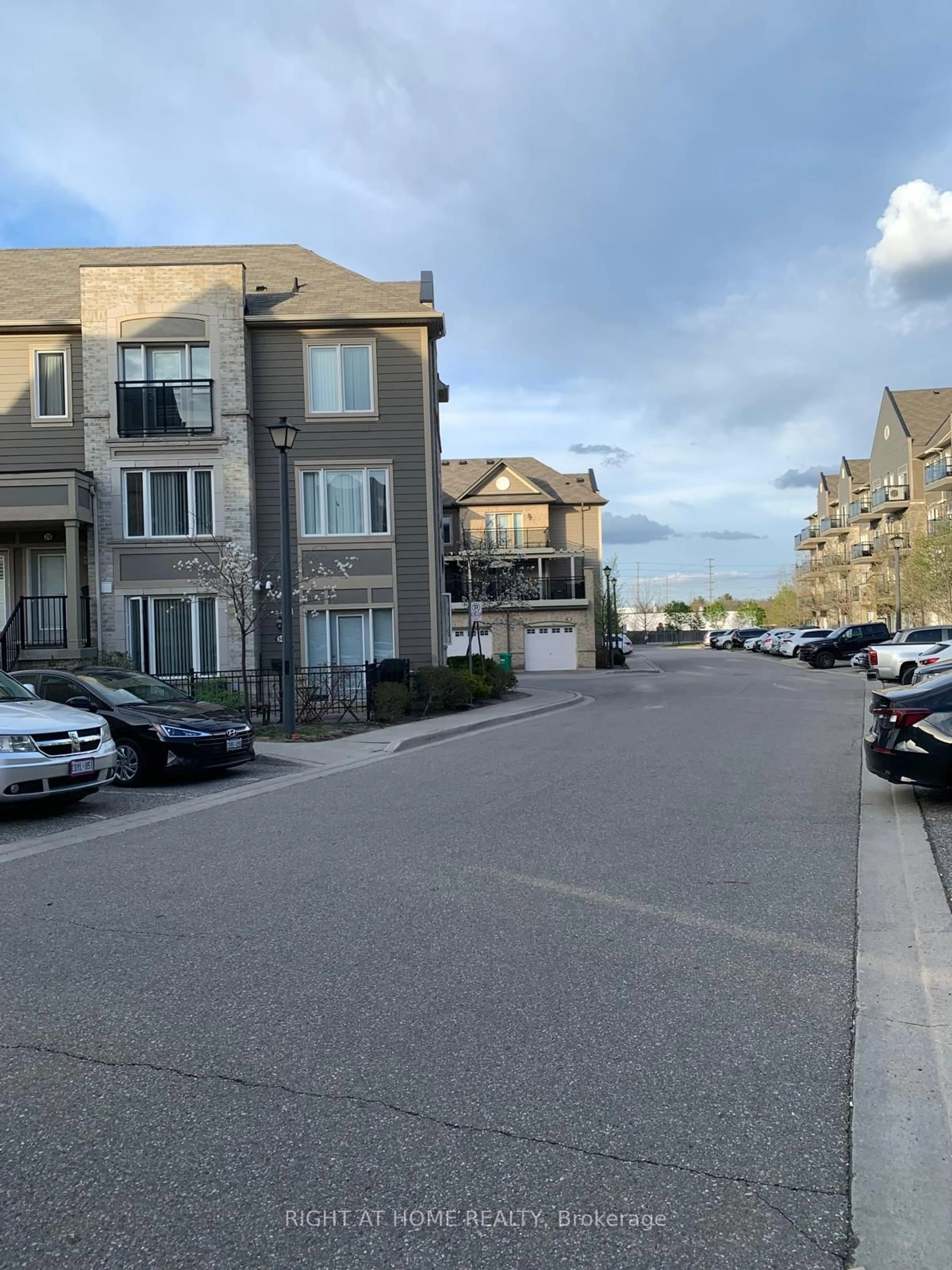 A pic from outside/outdoor area/front of a property/back of a property/a pic from drone, street for 3075 Thomas St #413, Mississauga Ontario L5M 0M4
