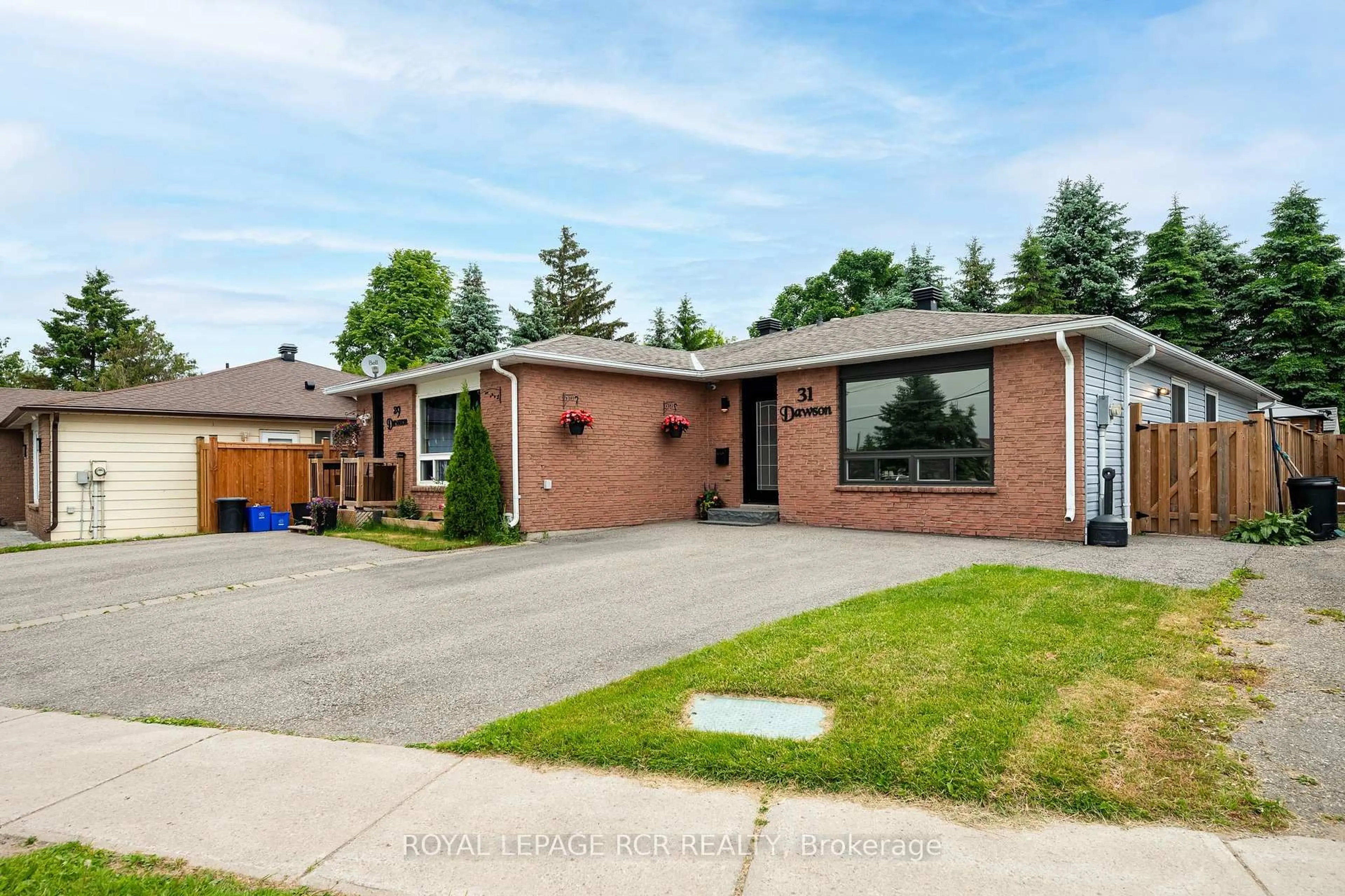 Home with brick exterior material, street for 31 Dawson Rd, Orangeville Ontario L9W 3T9