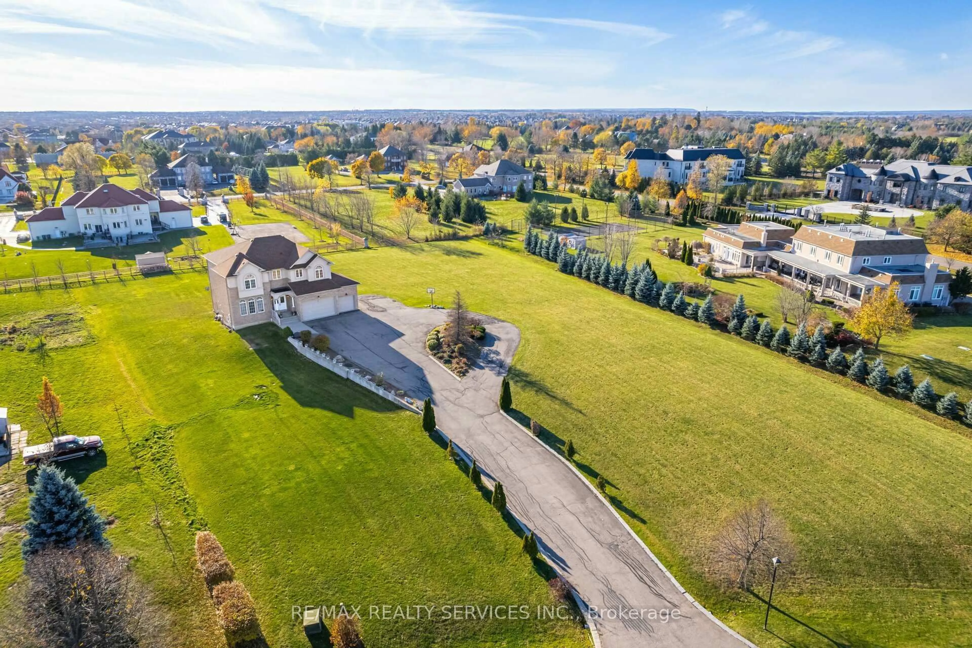 A pic from outside/outdoor area/front of a property/back of a property/a pic from drone, unknown for 5 Farina Dr, Brampton Ontario L6P 0E3