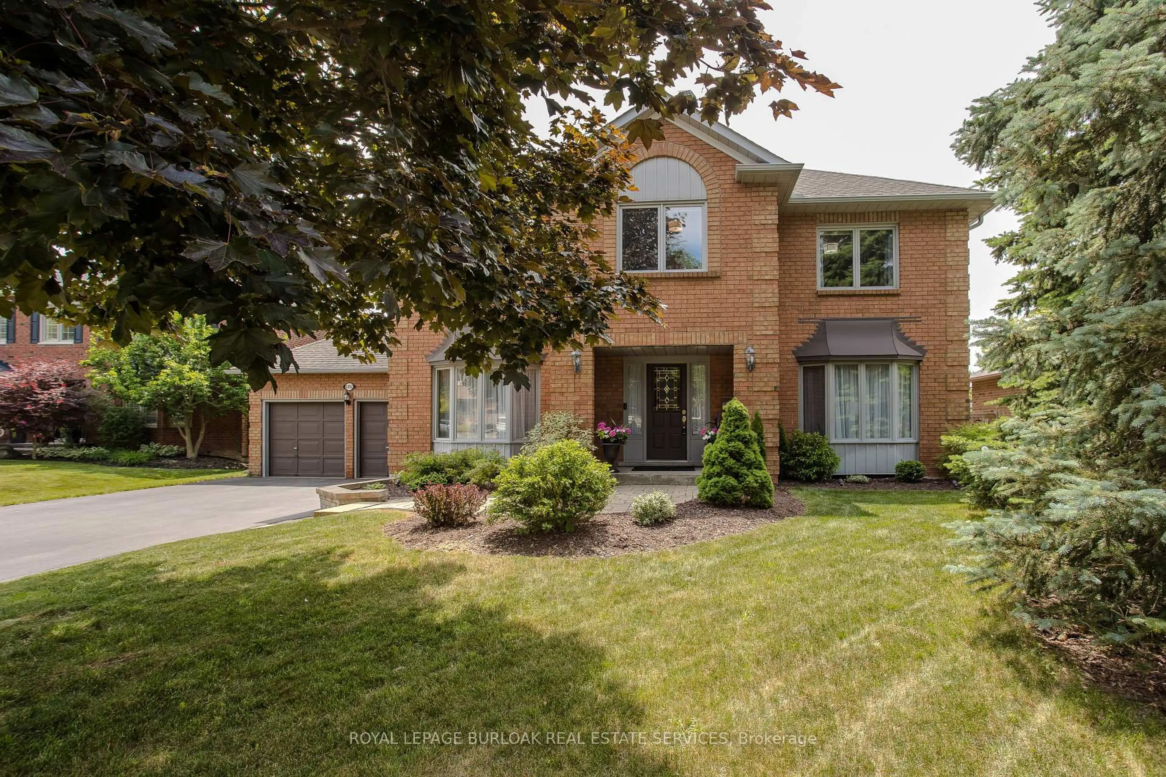 Home with brick exterior material, street for 1352 Winterberry Dr, Burlington Ontario L7P 4T8
