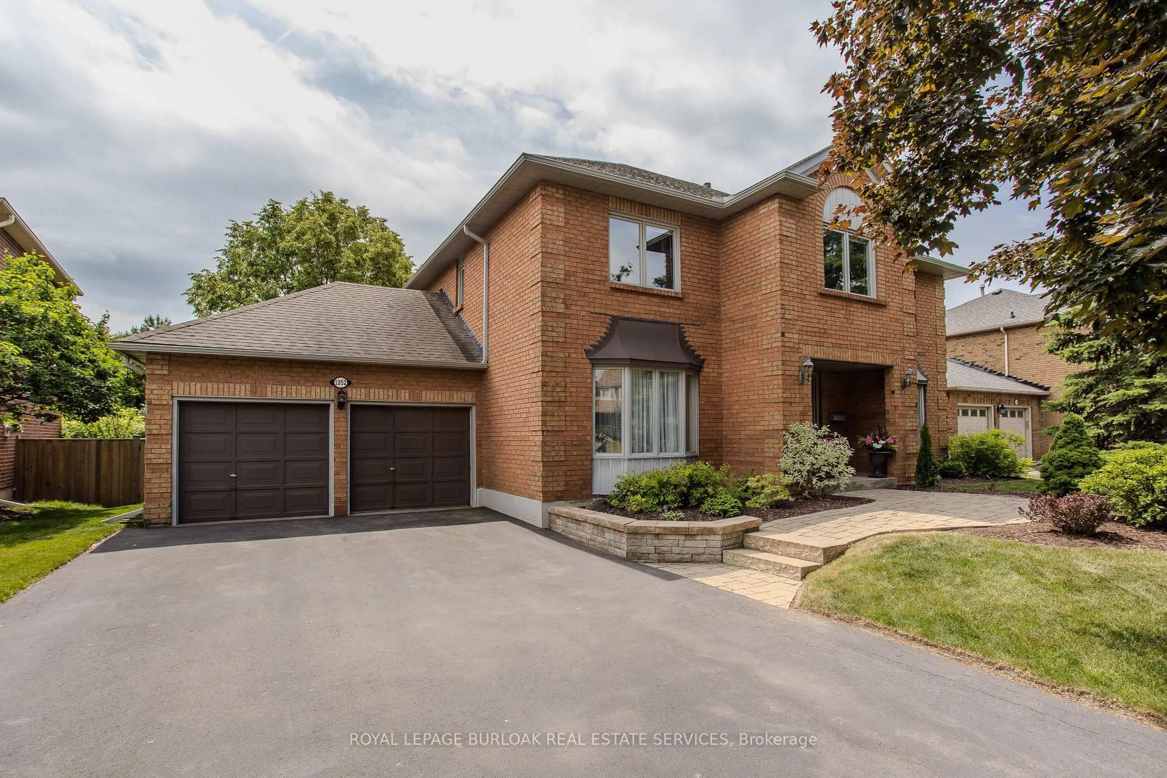 Home with brick exterior material, street for 1352 Winterberry Dr, Burlington Ontario L7P 4T8