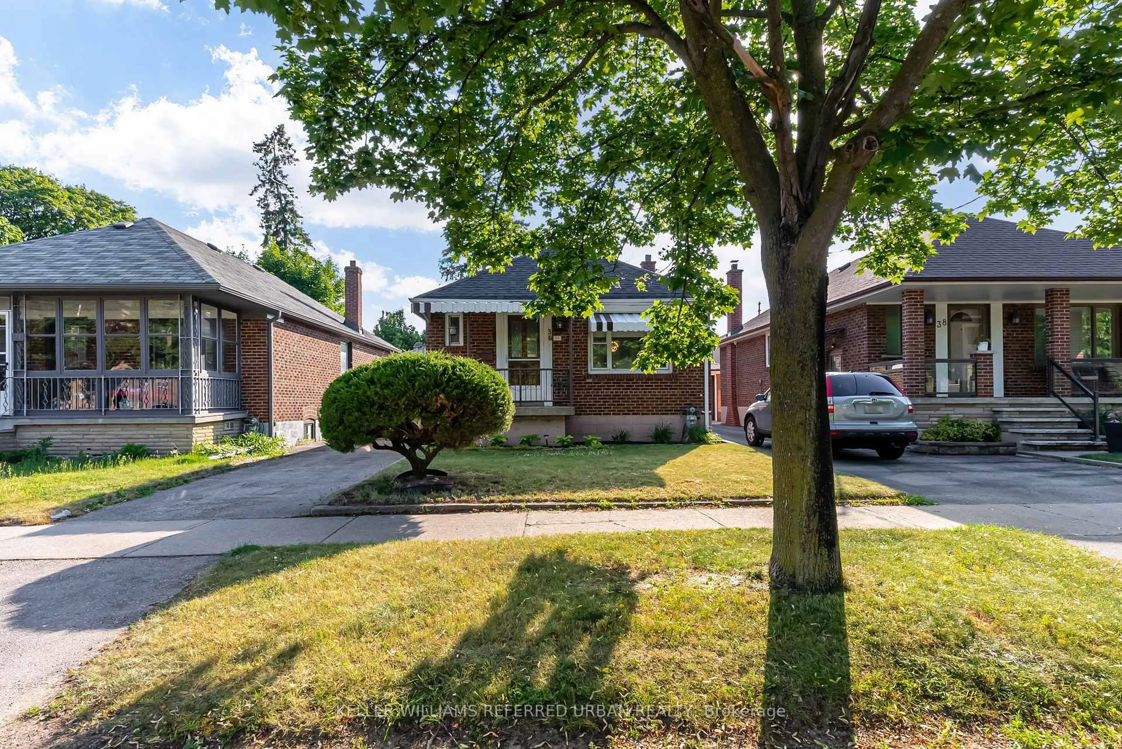 Home with brick exterior material, street for 36 Rothsay Ave, Toronto Ontario M8Z 4M3