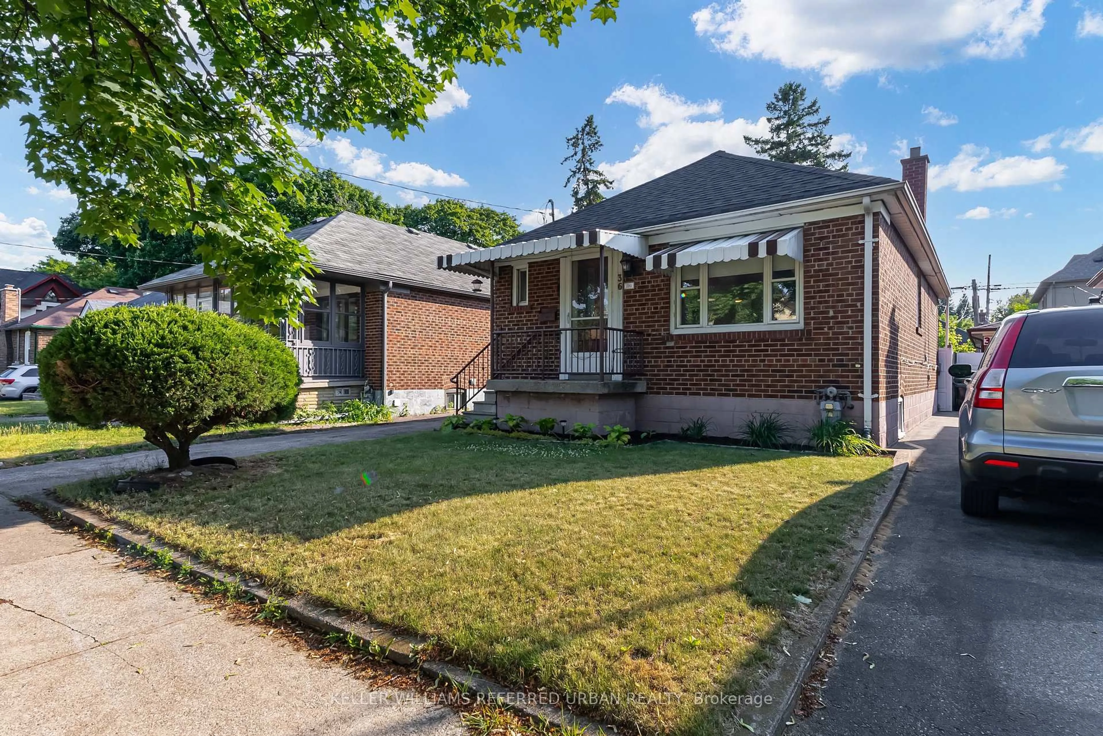 Home with brick exterior material, street for 36 Rothsay Ave, Toronto Ontario M8Z 4M3