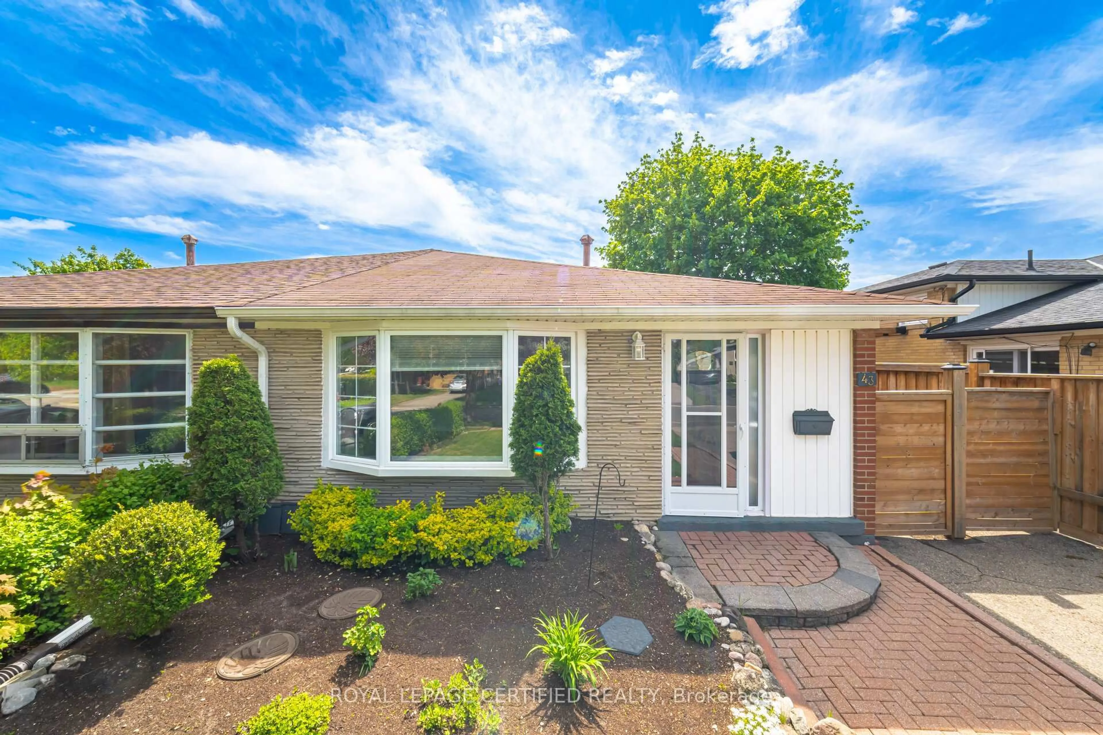 Home with vinyl exterior material, street for 43 Grange Dr, Brampton Ontario L6X 2H1