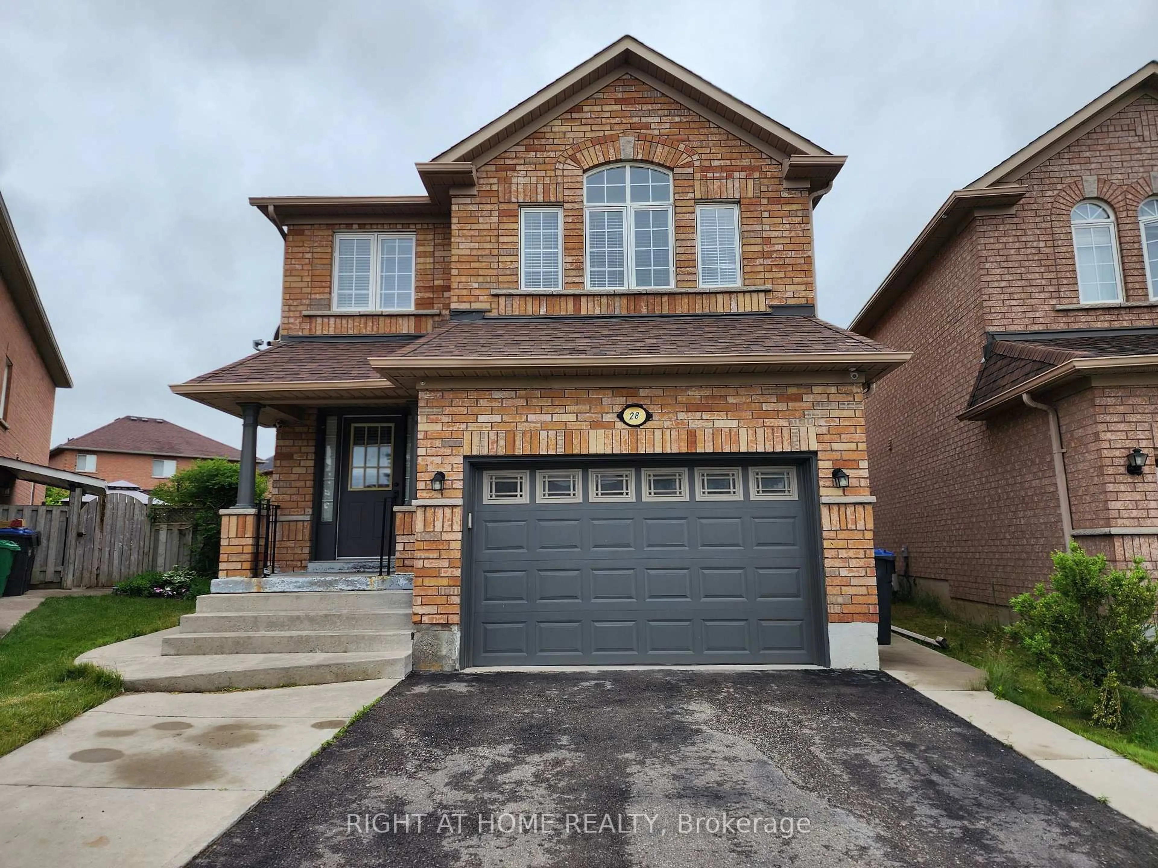 Home with brick exterior material, street for 28 Serenity Lane, Brampton Ontario L6R 2T1
