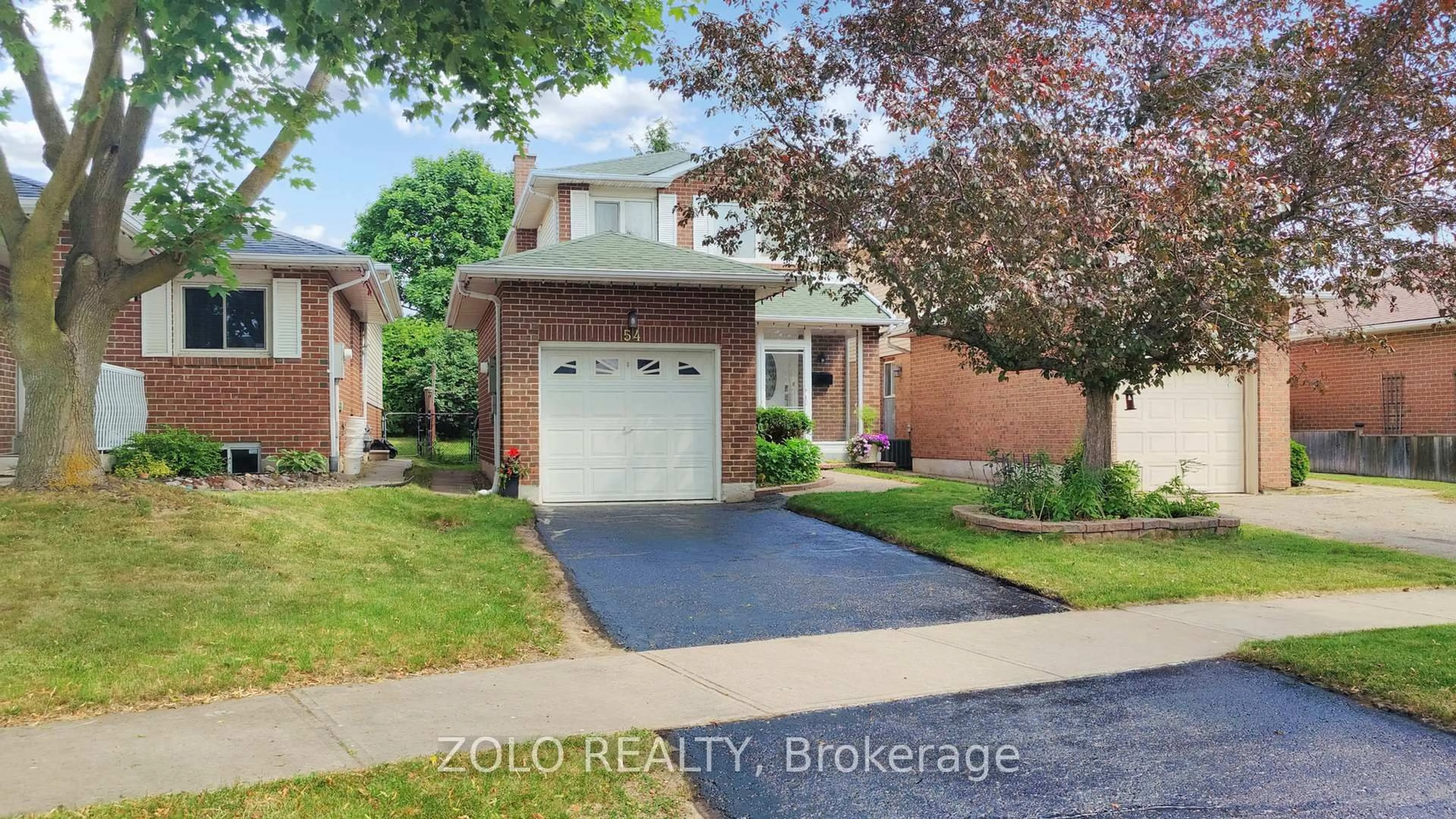 Home with brick exterior material, street for 54 Luminous Crt, Brampton Ontario L6Z 2B3
