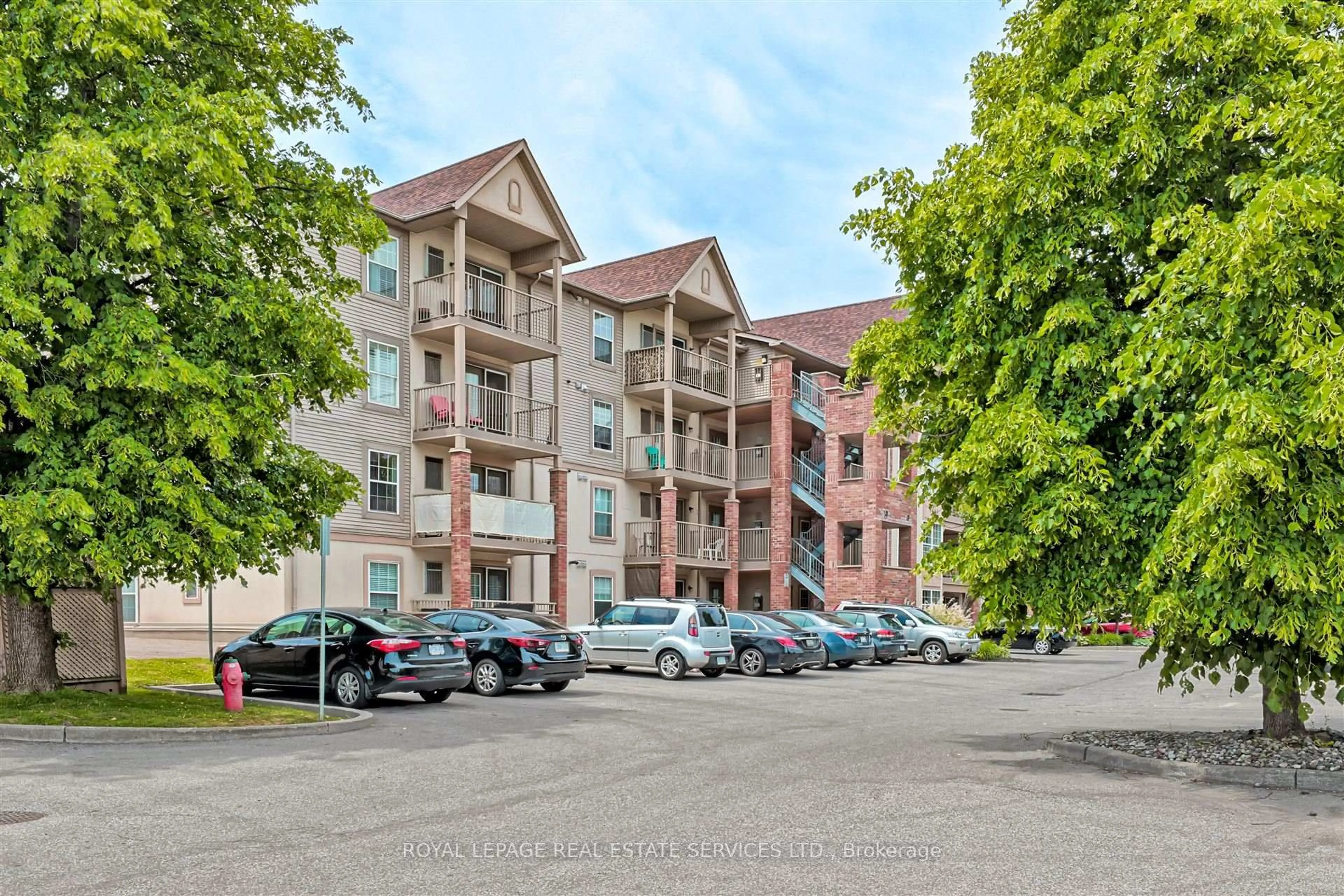 A pic from outside/outdoor area/front of a property/back of a property/a pic from drone, unknown for 4025 Kilmer Dr #407, Burlington Ontario L7M 4M5