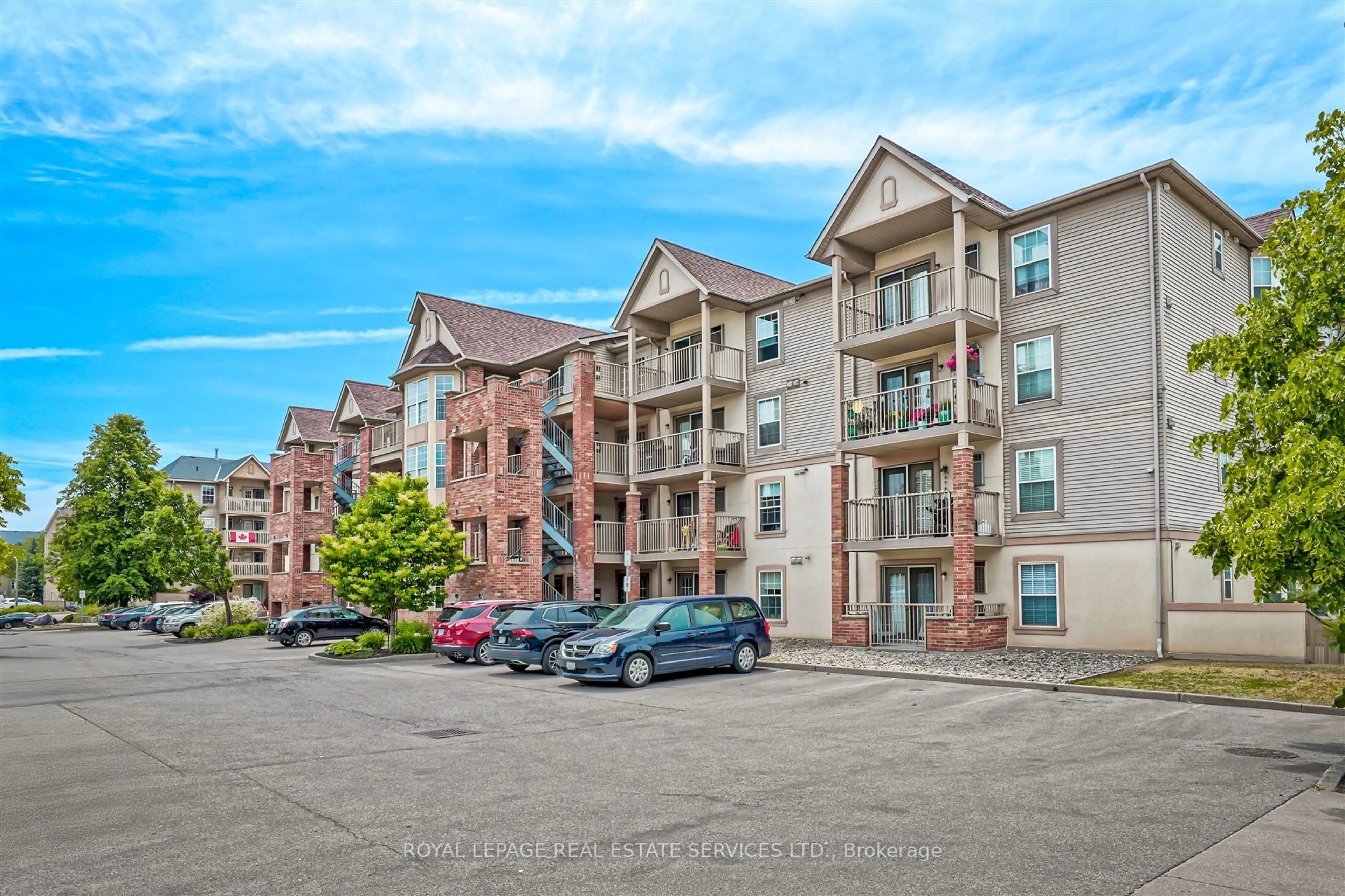 A pic from outside/outdoor area/front of a property/back of a property/a pic from drone, unknown for 4025 Kilmer Dr #407, Burlington Ontario L7M 4M5