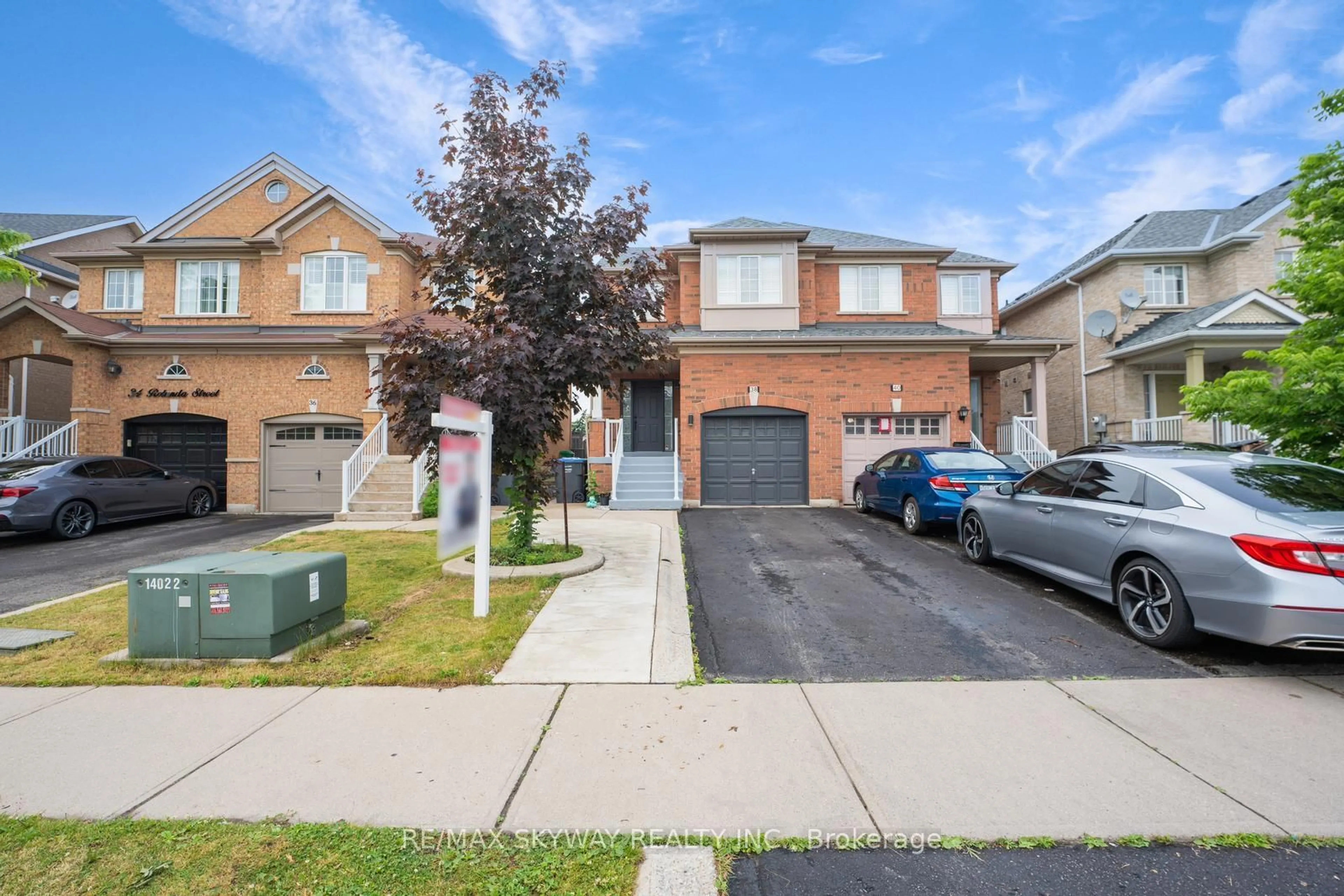 A pic from outside/outdoor area/front of a property/back of a property/a pic from drone, street for 38 Rotunda St, Brampton Ontario L6X 5E5