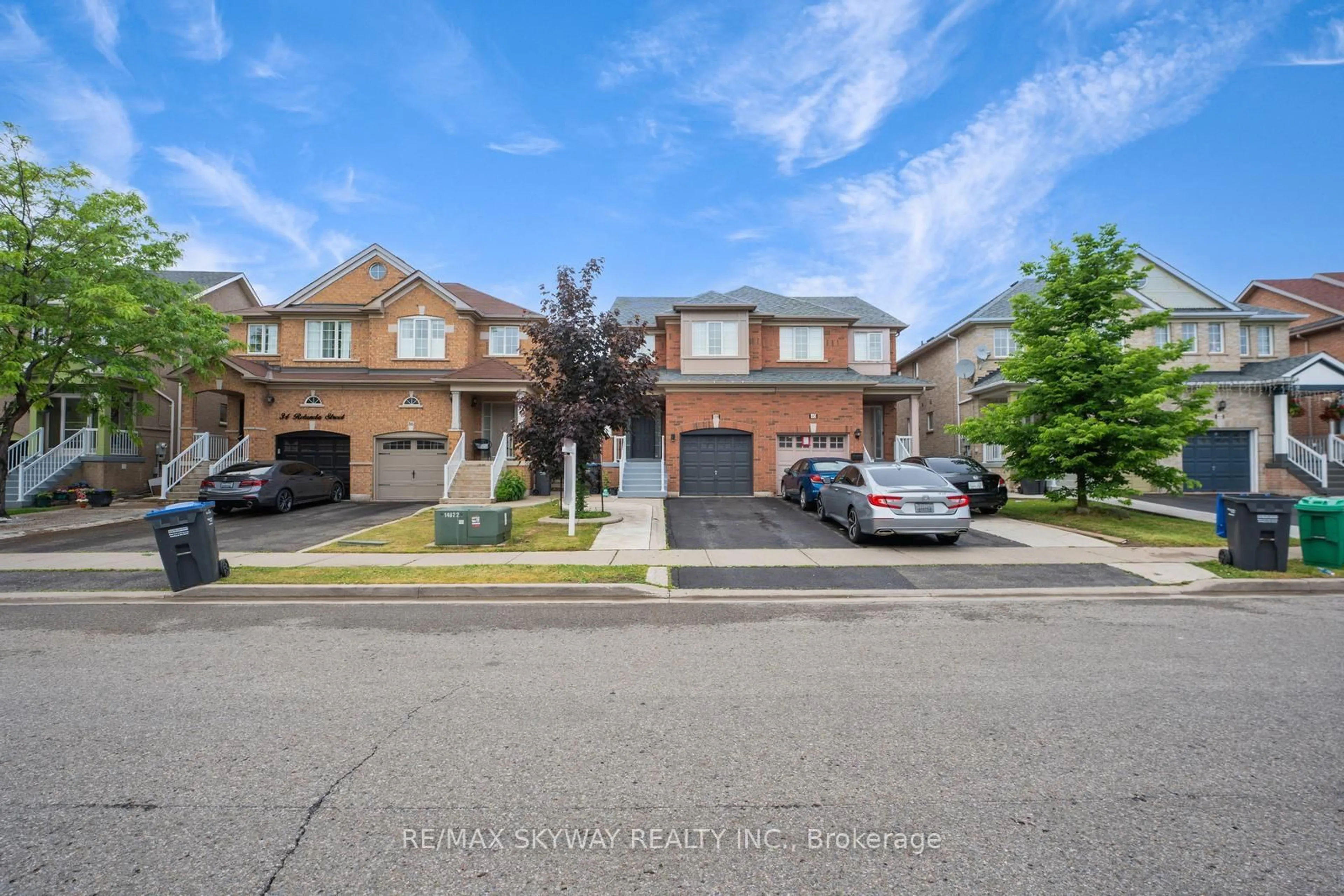 A pic from outside/outdoor area/front of a property/back of a property/a pic from drone, street for 38 Rotunda St, Brampton Ontario L6X 5E5
