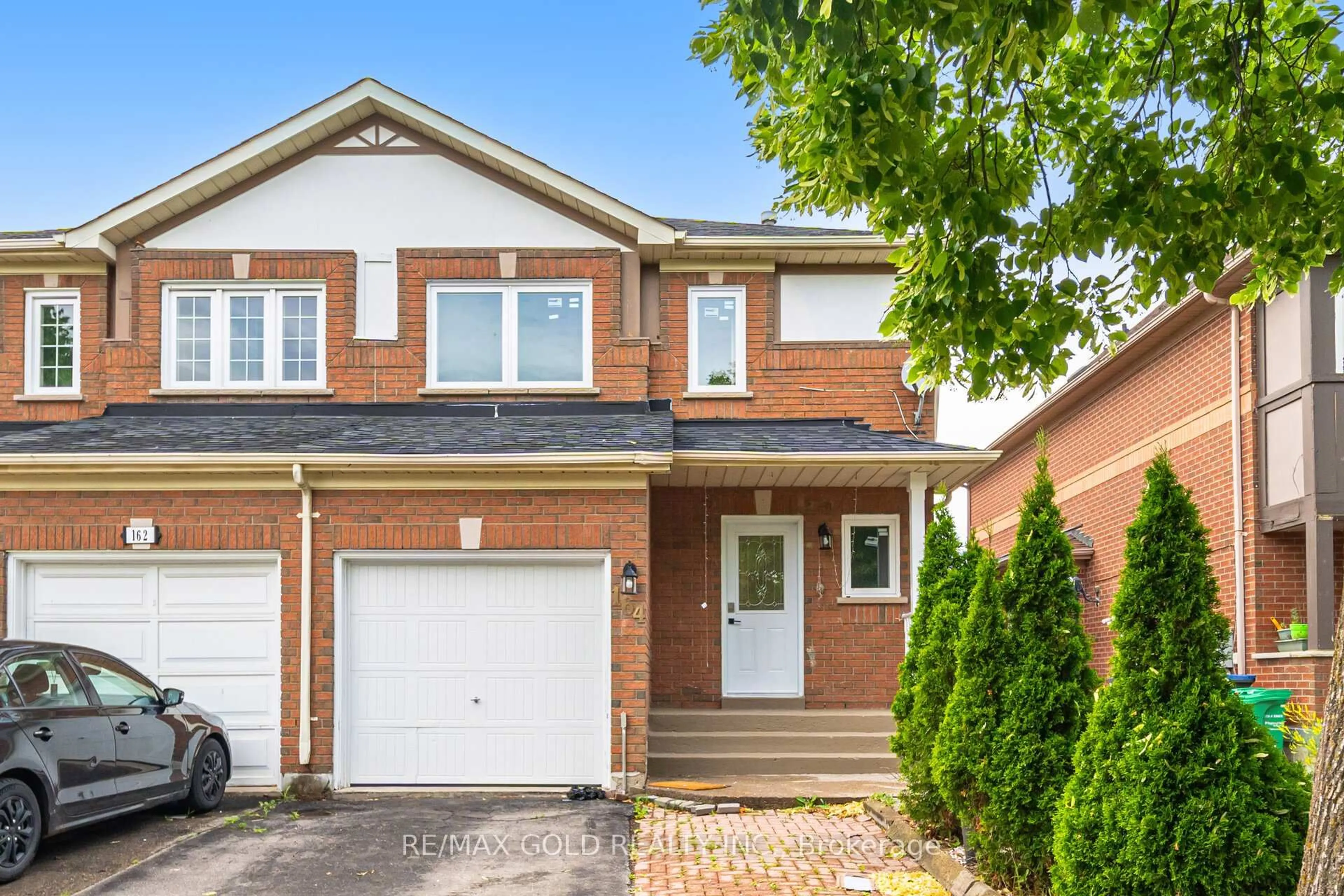 Home with brick exterior material, street for 164 Rainforest Dr, Brampton Ontario L6R 1A4