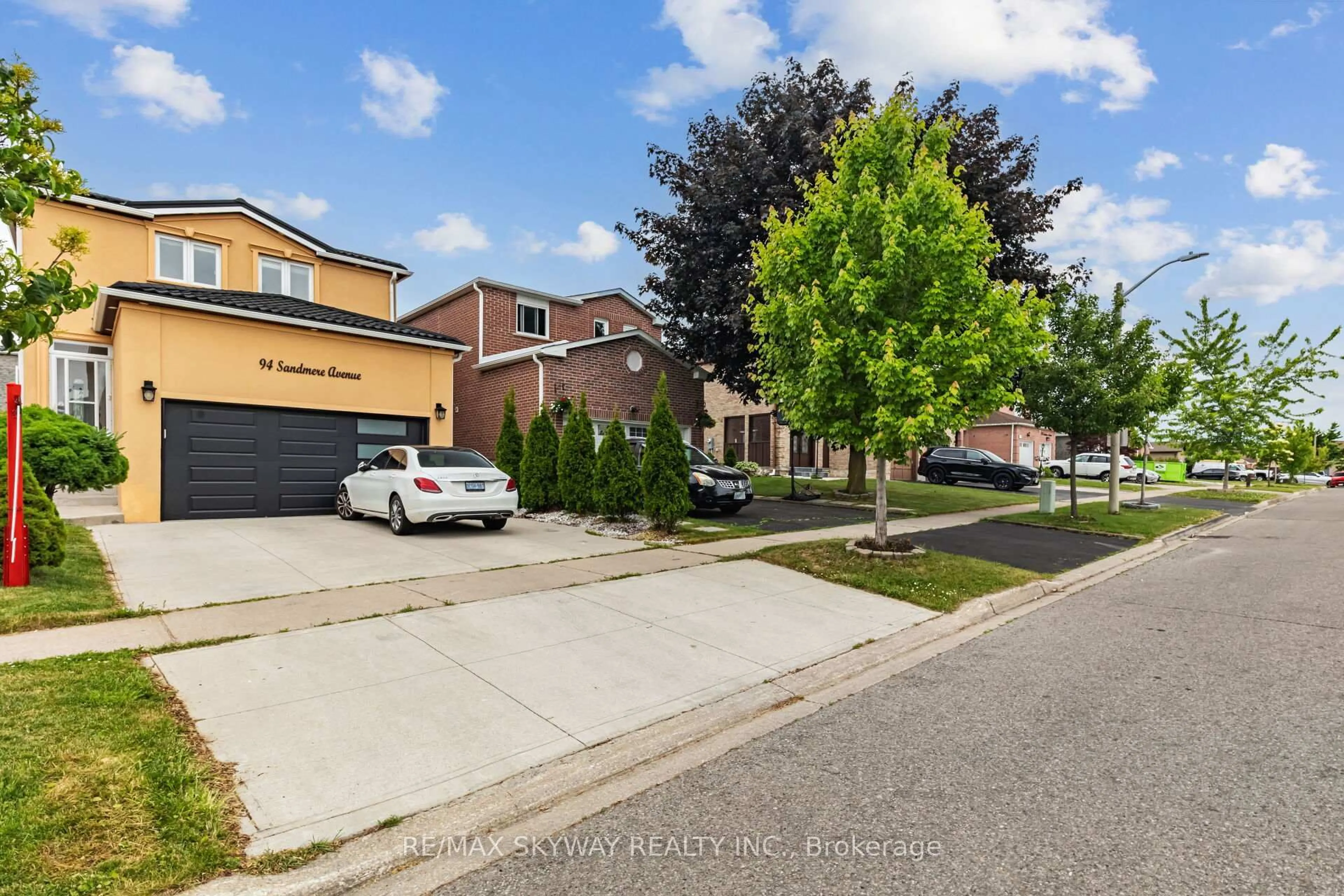A pic from outside/outdoor area/front of a property/back of a property/a pic from drone, street for 94 Sandmere Ave, Brampton Ontario L6Z 3Z9