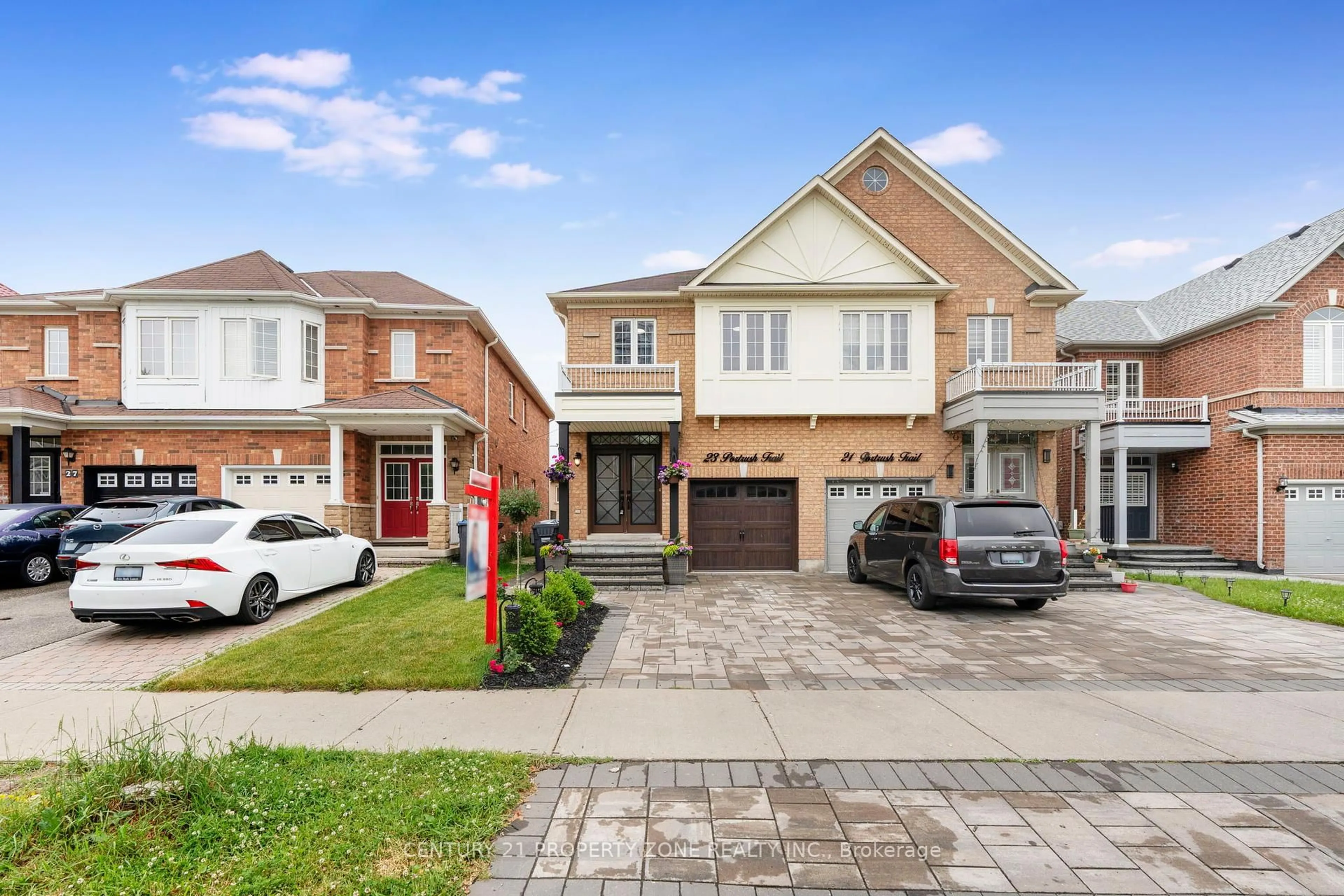 Home with brick exterior material, street for 23 Portrush Tr, Brampton Ontario L6X 0R4