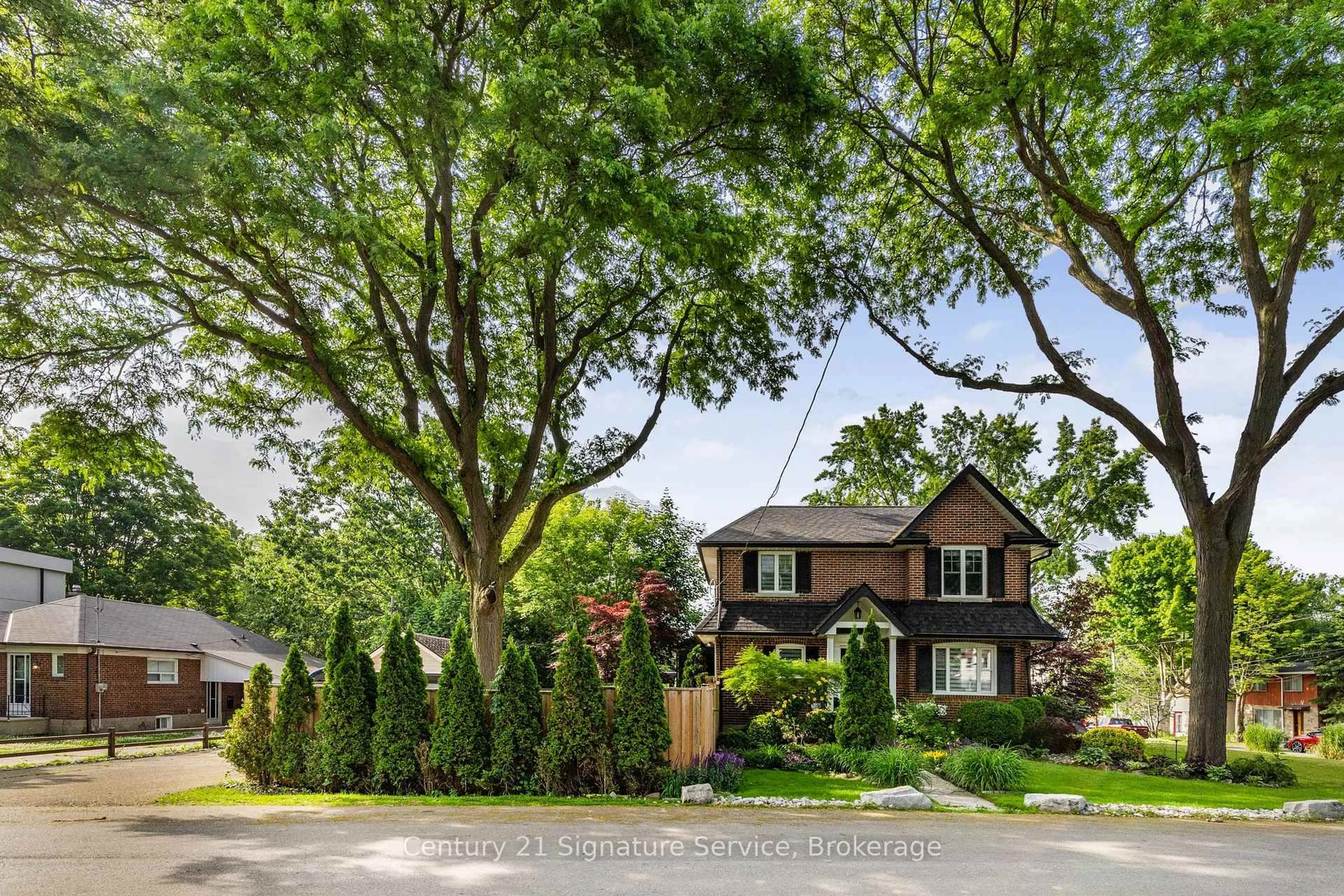 Home with brick exterior material, street for 33 McIntosh Ave, Toronto Ontario M8Y 3E1