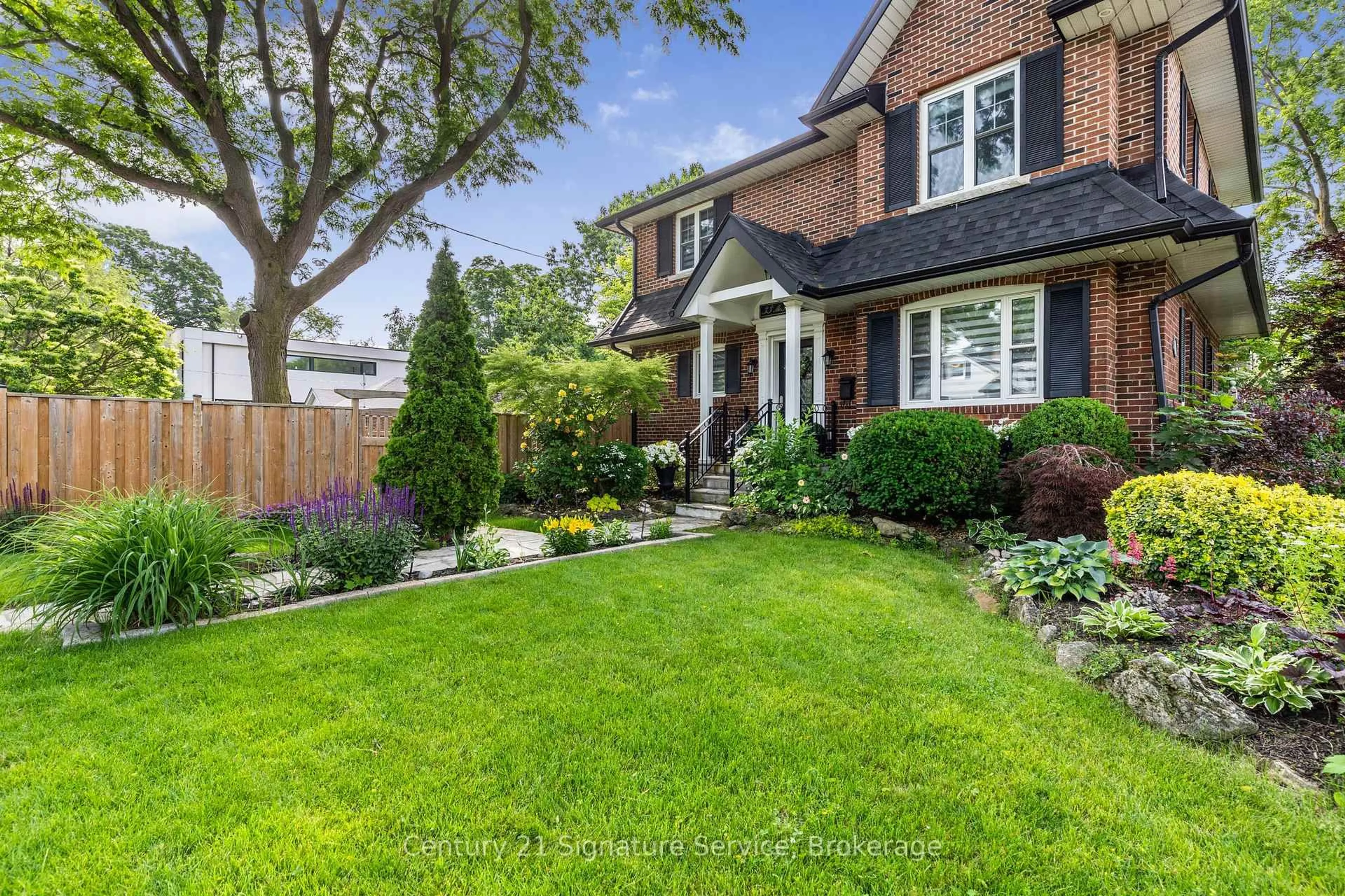 Home with brick exterior material, street for 33 McIntosh Ave, Toronto Ontario M8Y 3E1