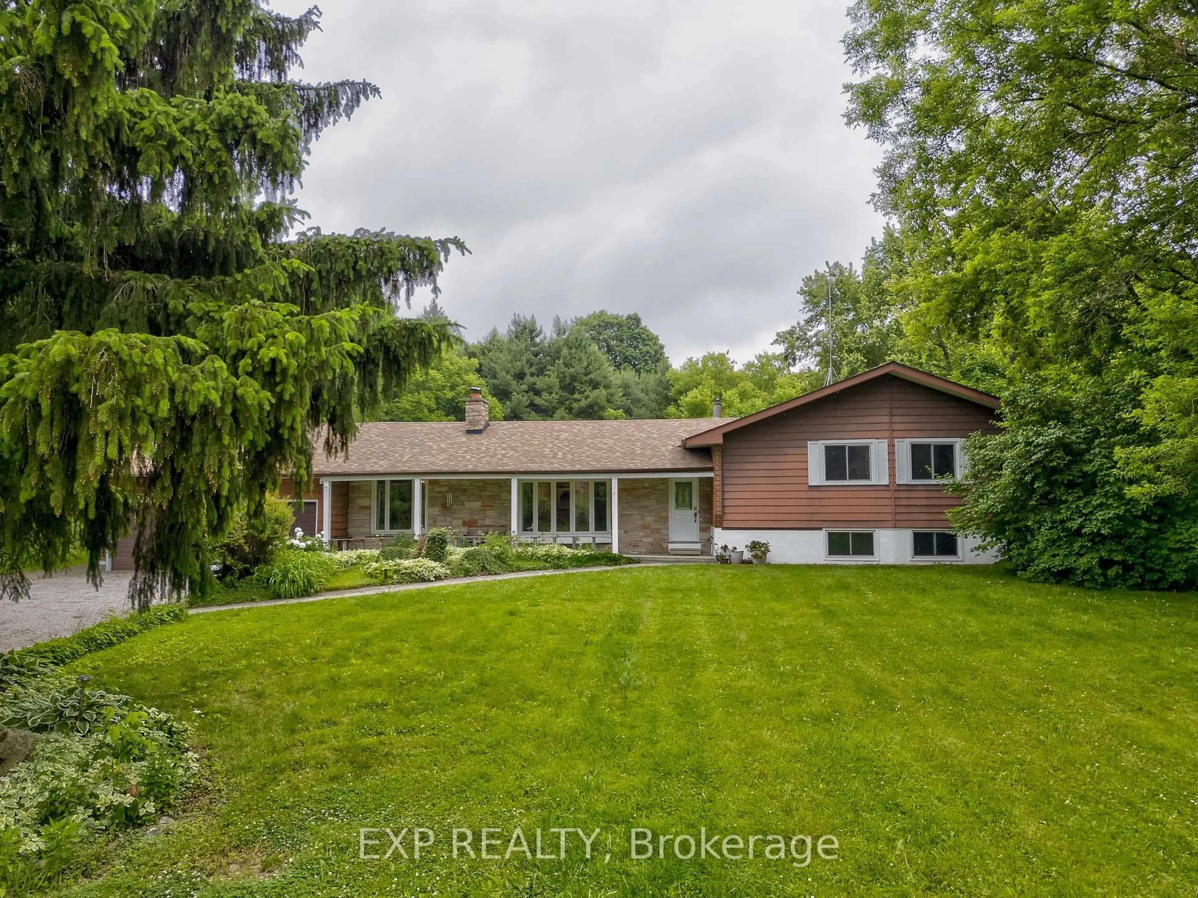 A pic from outside/outdoor area/front of a property/back of a property/a pic from drone, water/lake/river/ocean view for 7633 Appleby Line, Milton Ontario L9E 0M3