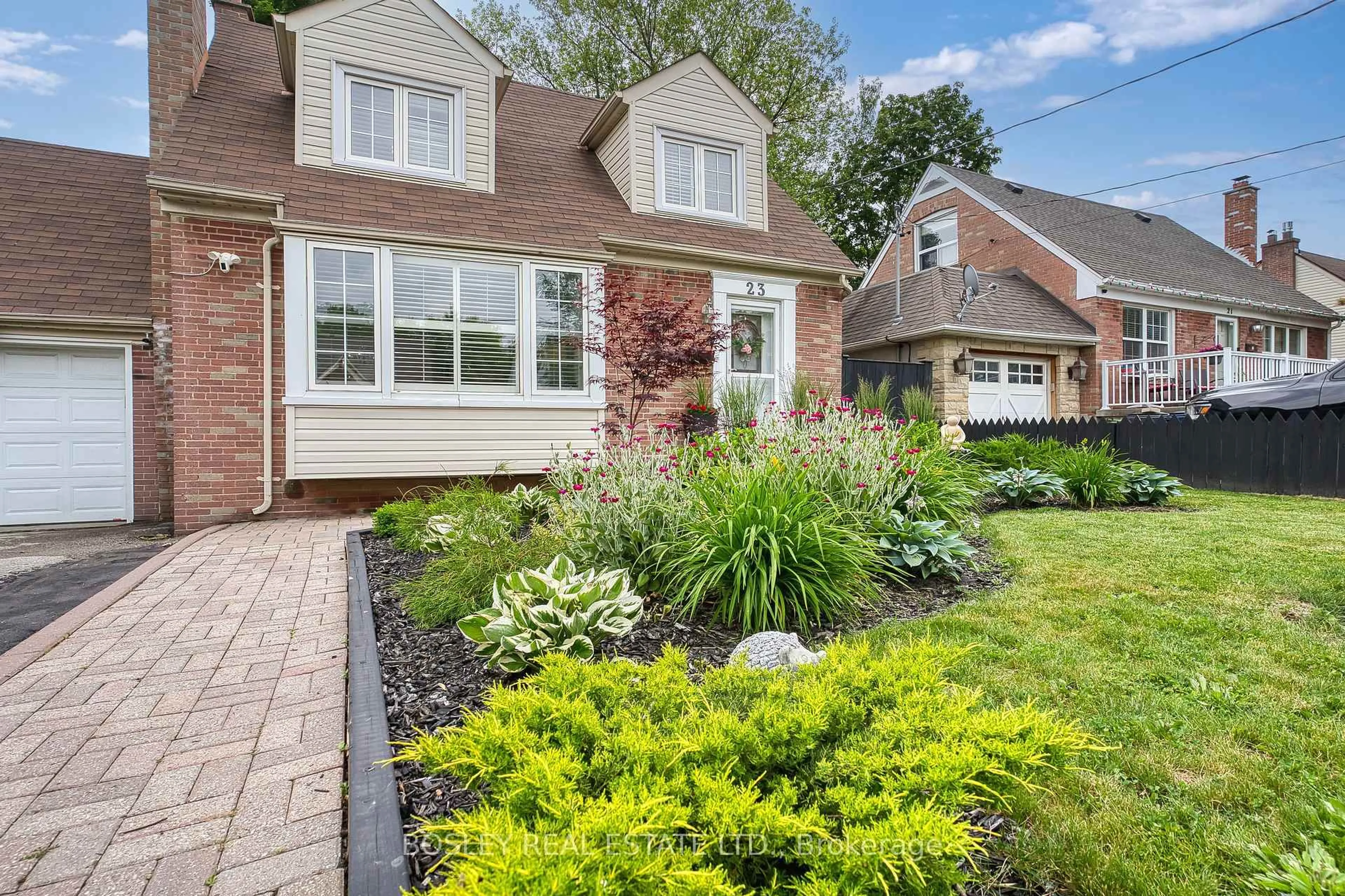 Home with brick exterior material, street for 23 Farnsworth Dr, Toronto Ontario M9N 2Z5