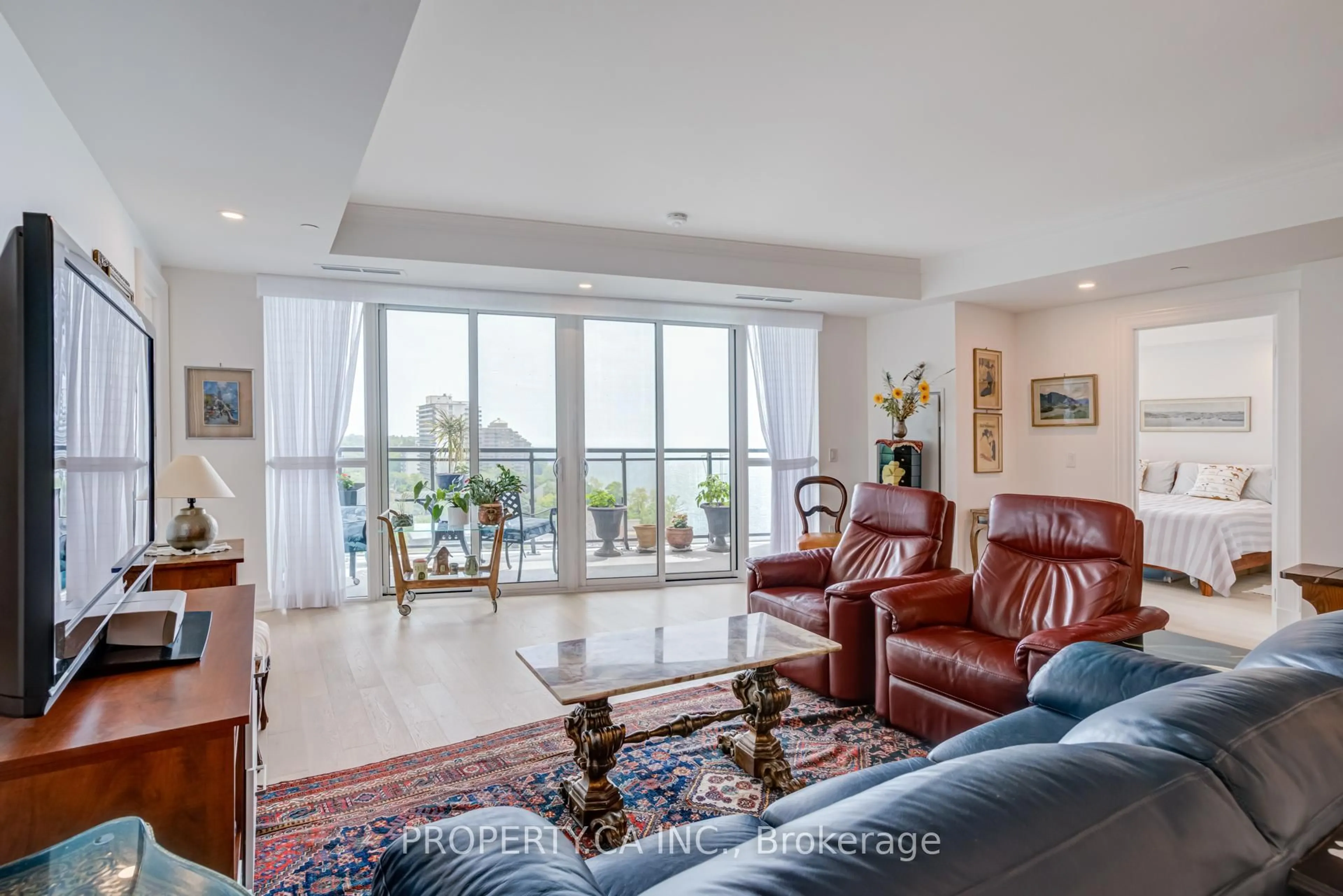 Living room with furniture, unknown for 2060 Lakeshore Rd #902, Burlington Ontario L7R 0G2