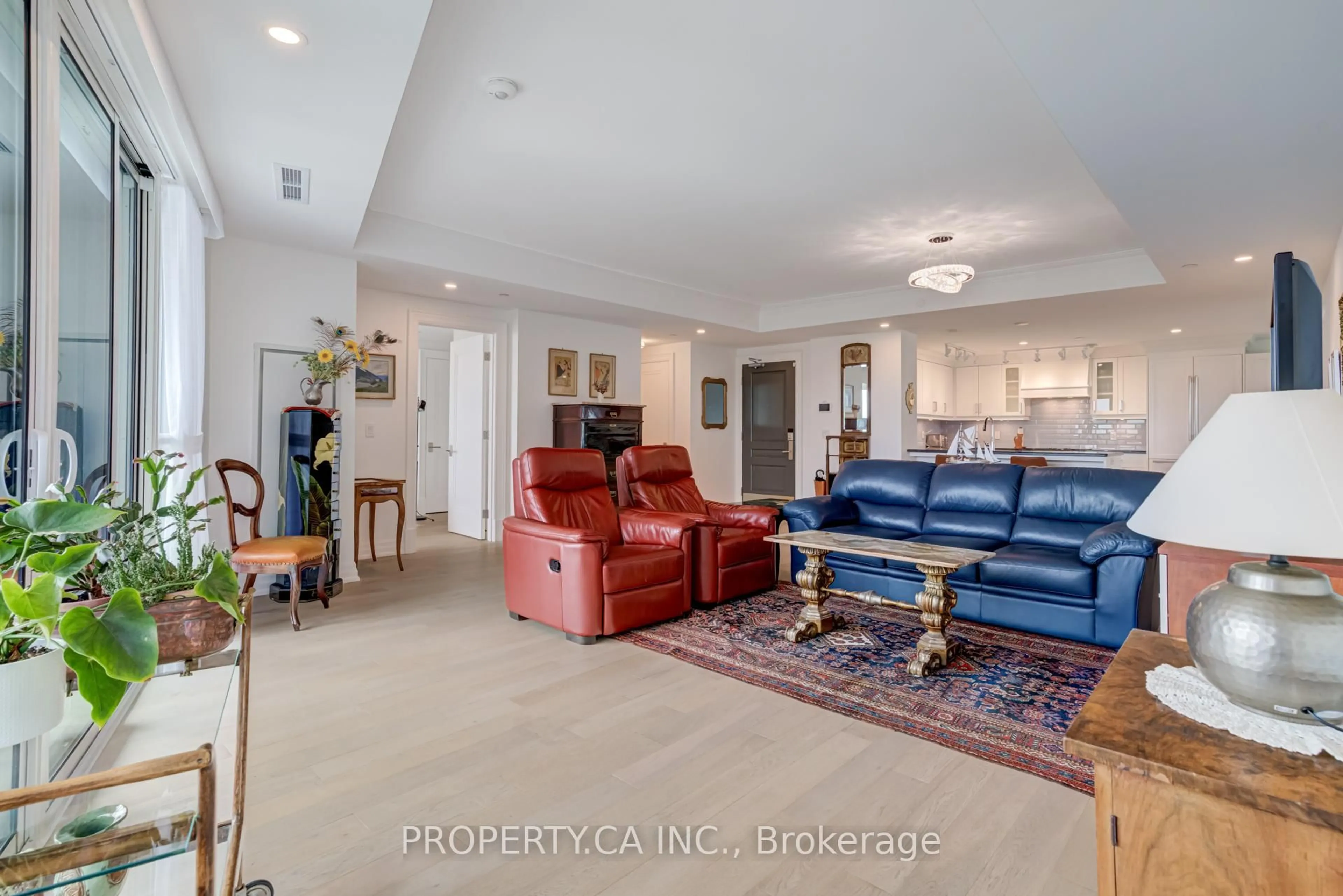 Living room with furniture, ceramic/tile floor for 2060 Lakeshore Rd #902, Burlington Ontario L7R 0G2