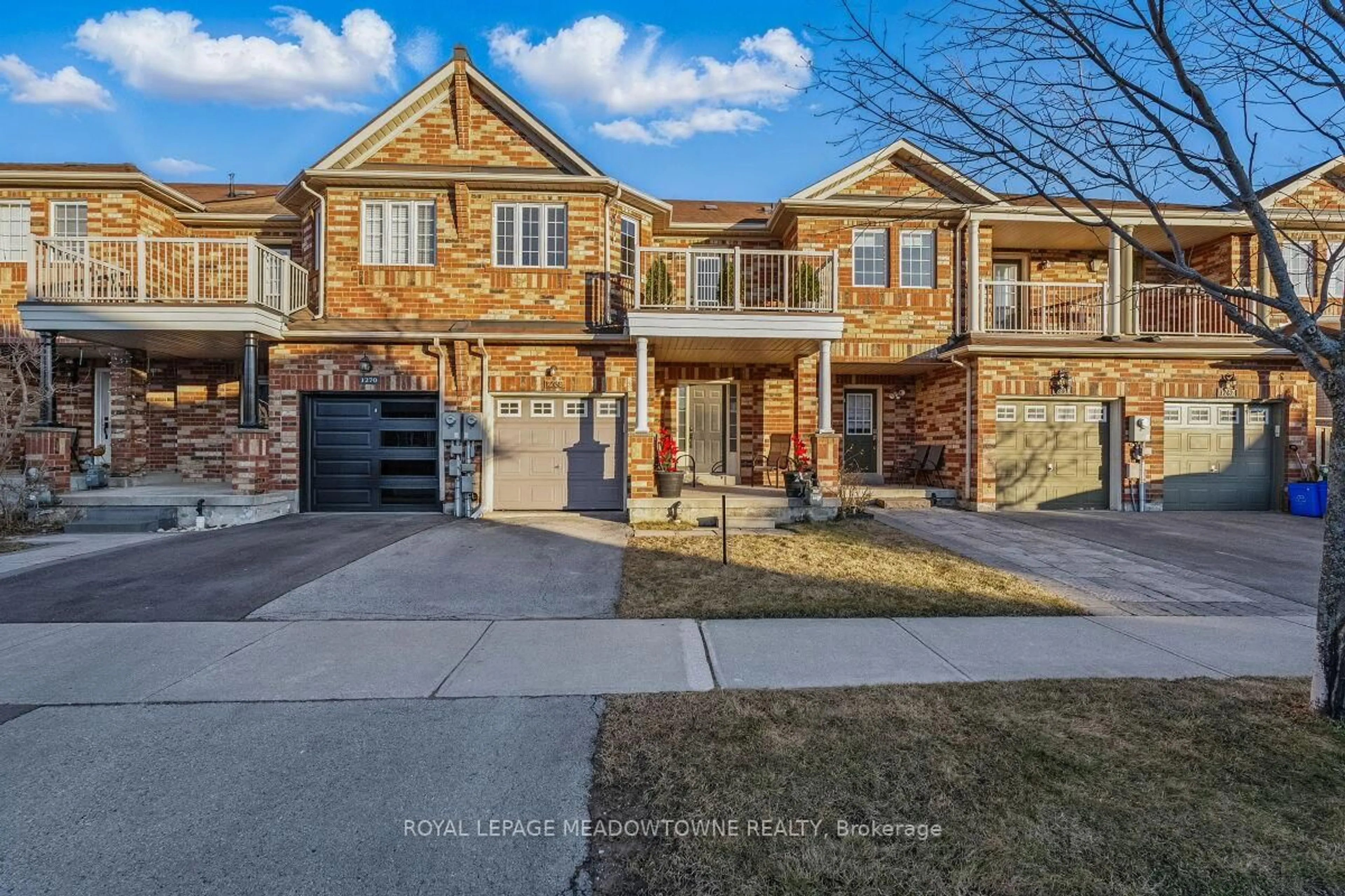 Home with brick exterior material, street for 1268 Cartmer Way, Milton Ontario L9T 6J8