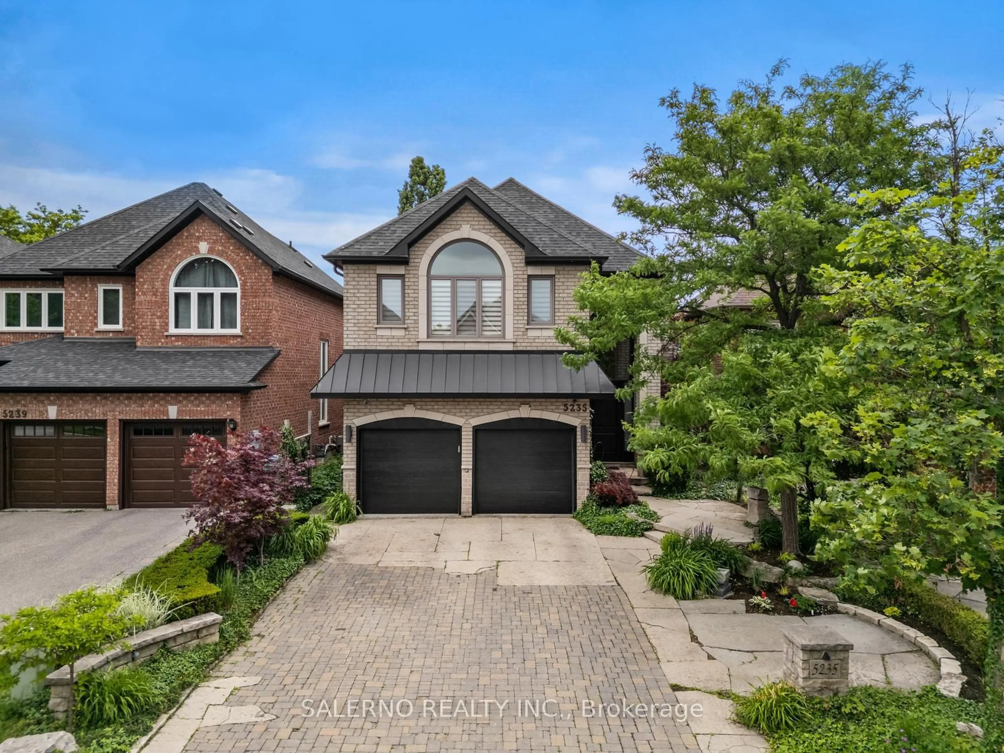 Home with brick exterior material, street for 5235 Forestwalk Circ, Mississauga Ontario L4Z 4A3