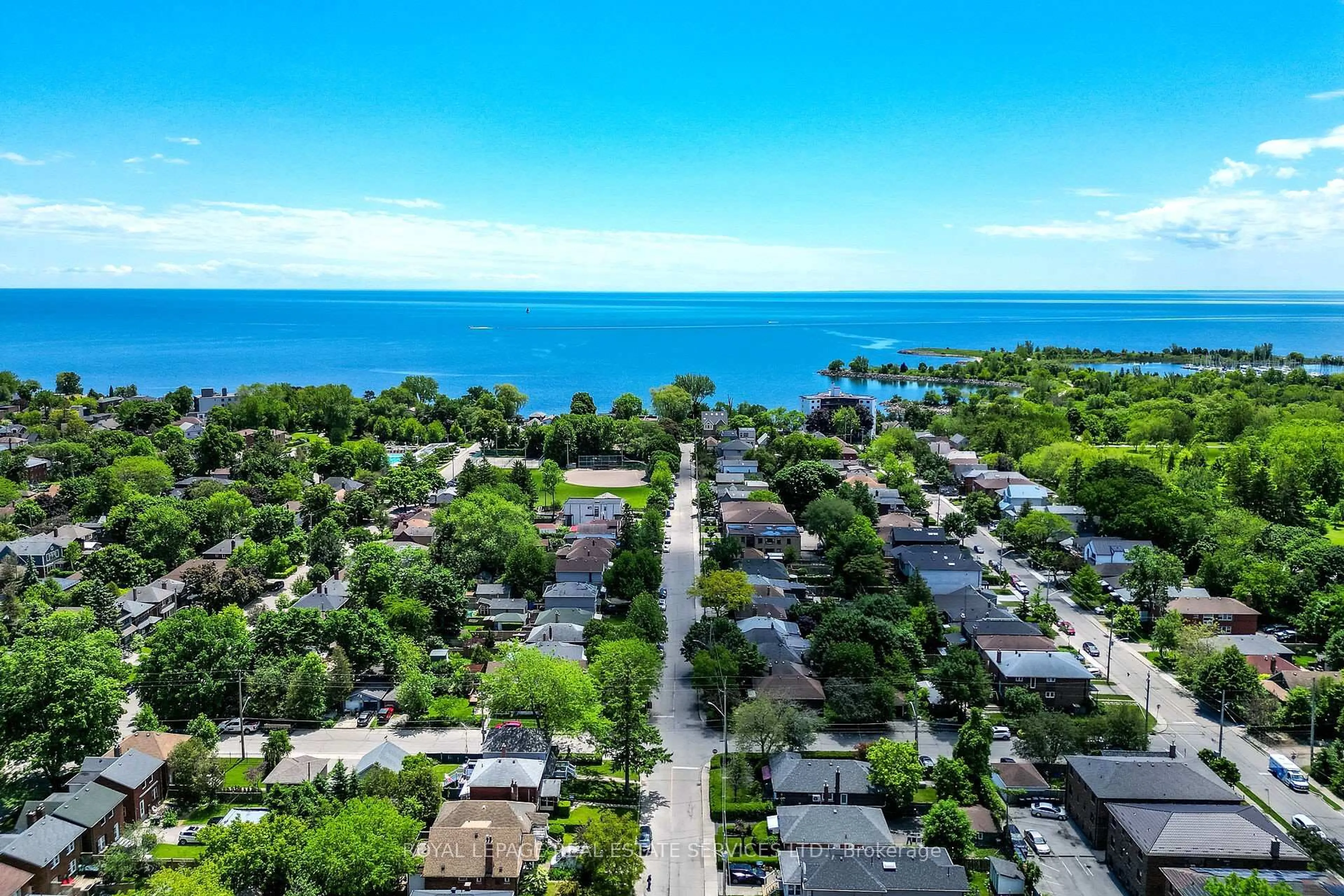 A pic from outside/outdoor area/front of a property/back of a property/a pic from drone, water/lake/river/ocean view for 6 Twelfth St, Toronto Ontario M8V 3G7