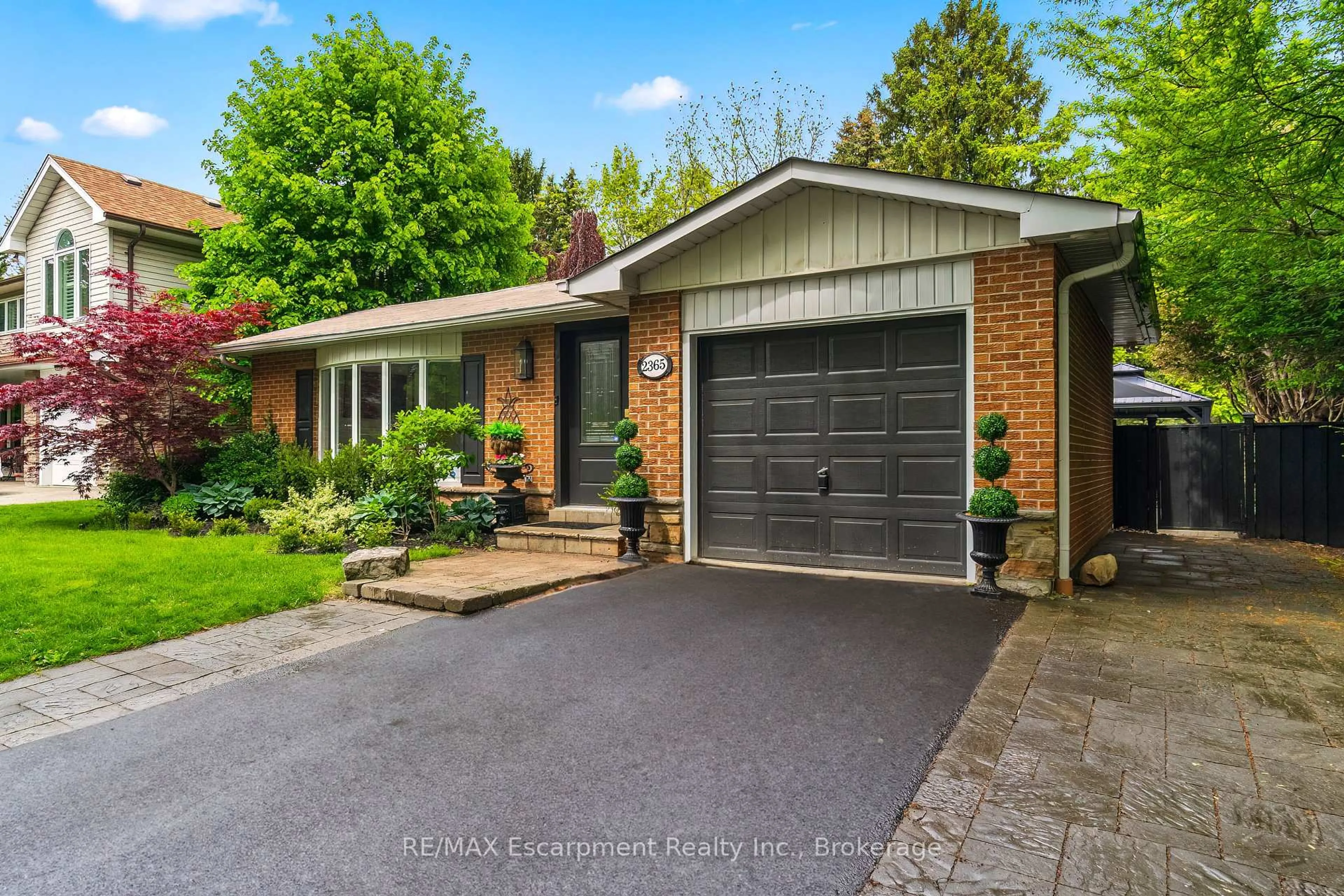 Home with brick exterior material, street for 2365 Devon Rd, Oakville Ontario L6J 5R6