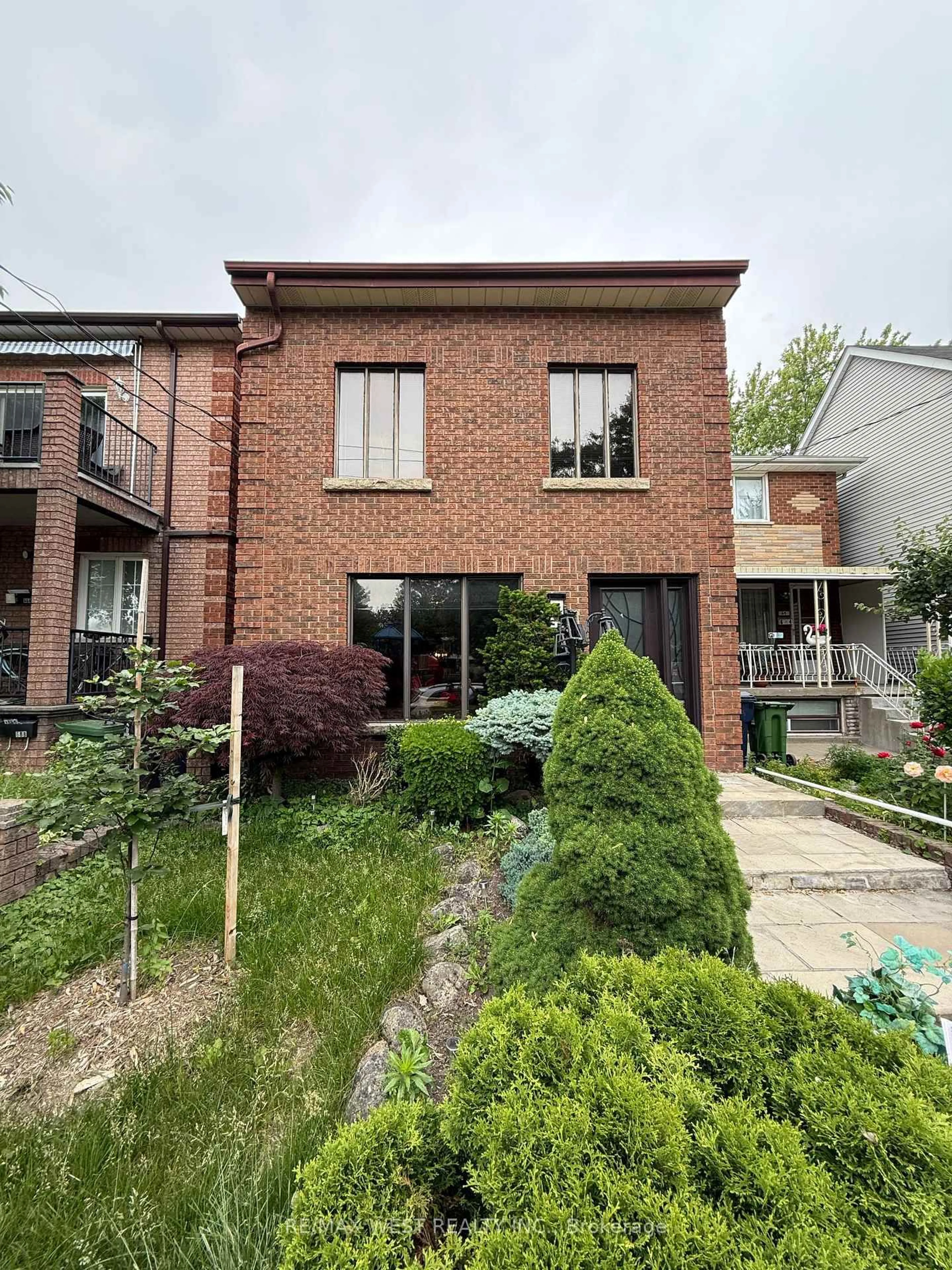 Home with brick exterior material, street for 66 Garnet Ave, Toronto Ontario M6G 1V7