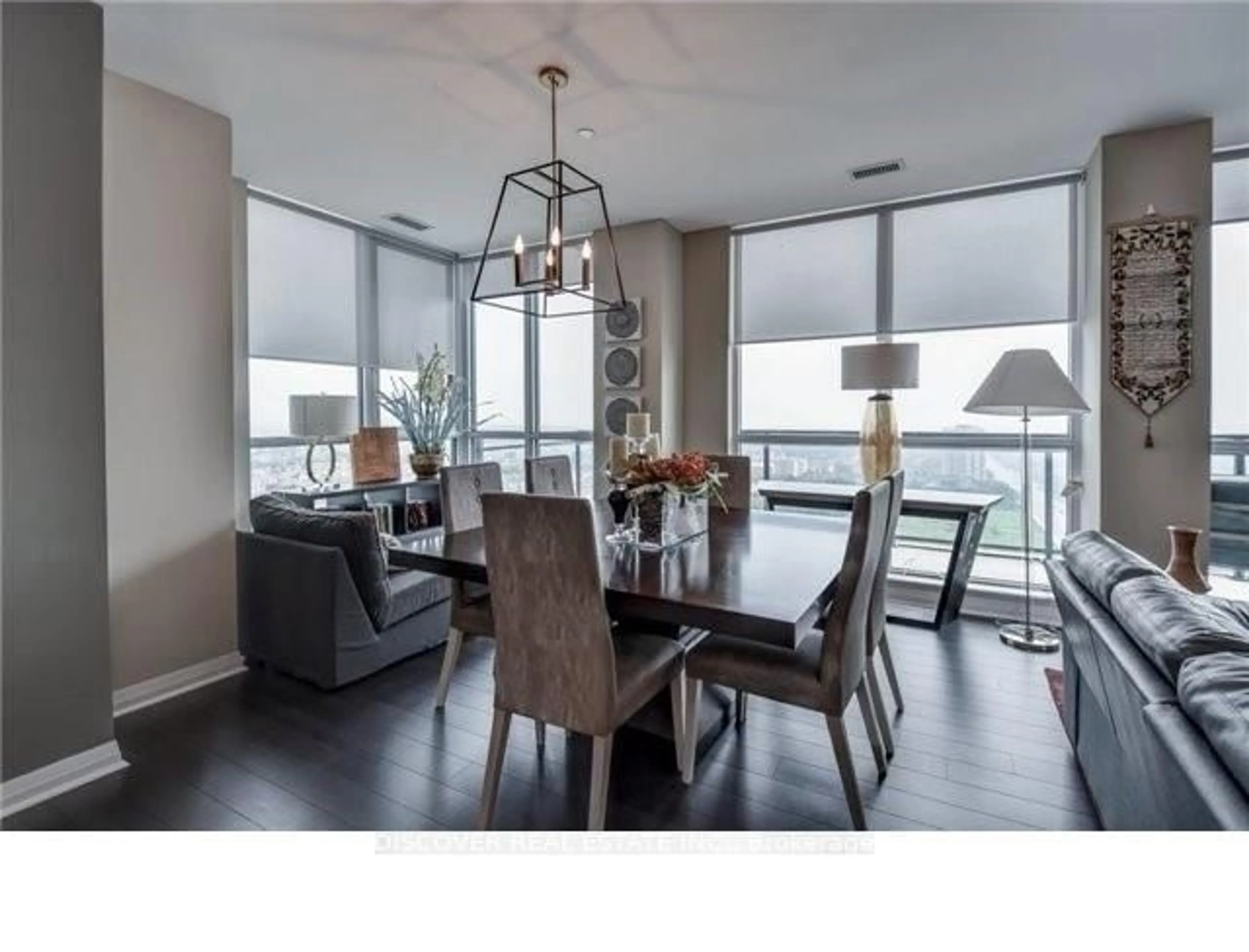Dining room, wood/laminate floor for 55 Eglinton Ave #2402, Mississauga Ontario L5R 0E4