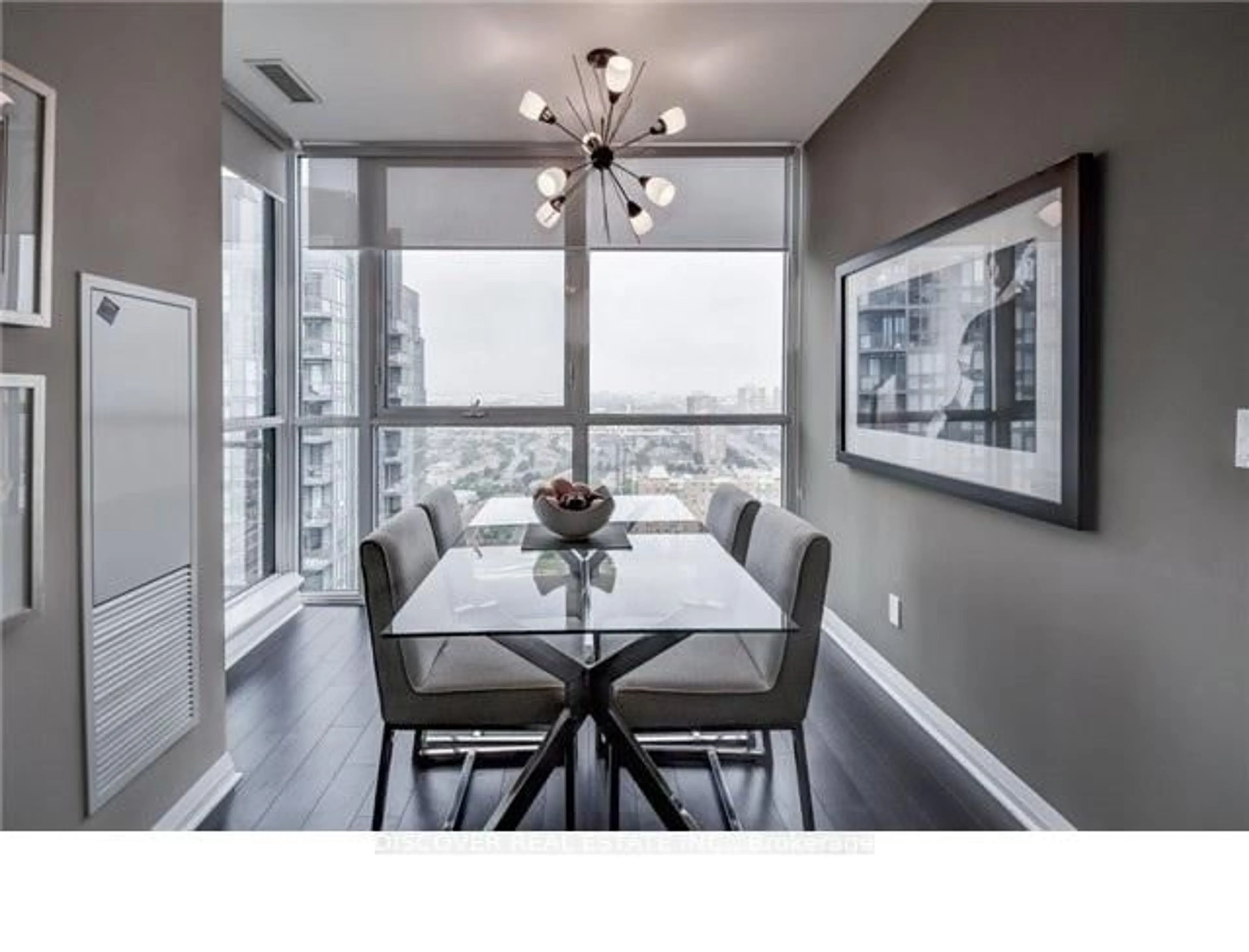 Dining room, wood/laminate floor for 55 Eglinton Ave #2402, Mississauga Ontario L5R 0E4