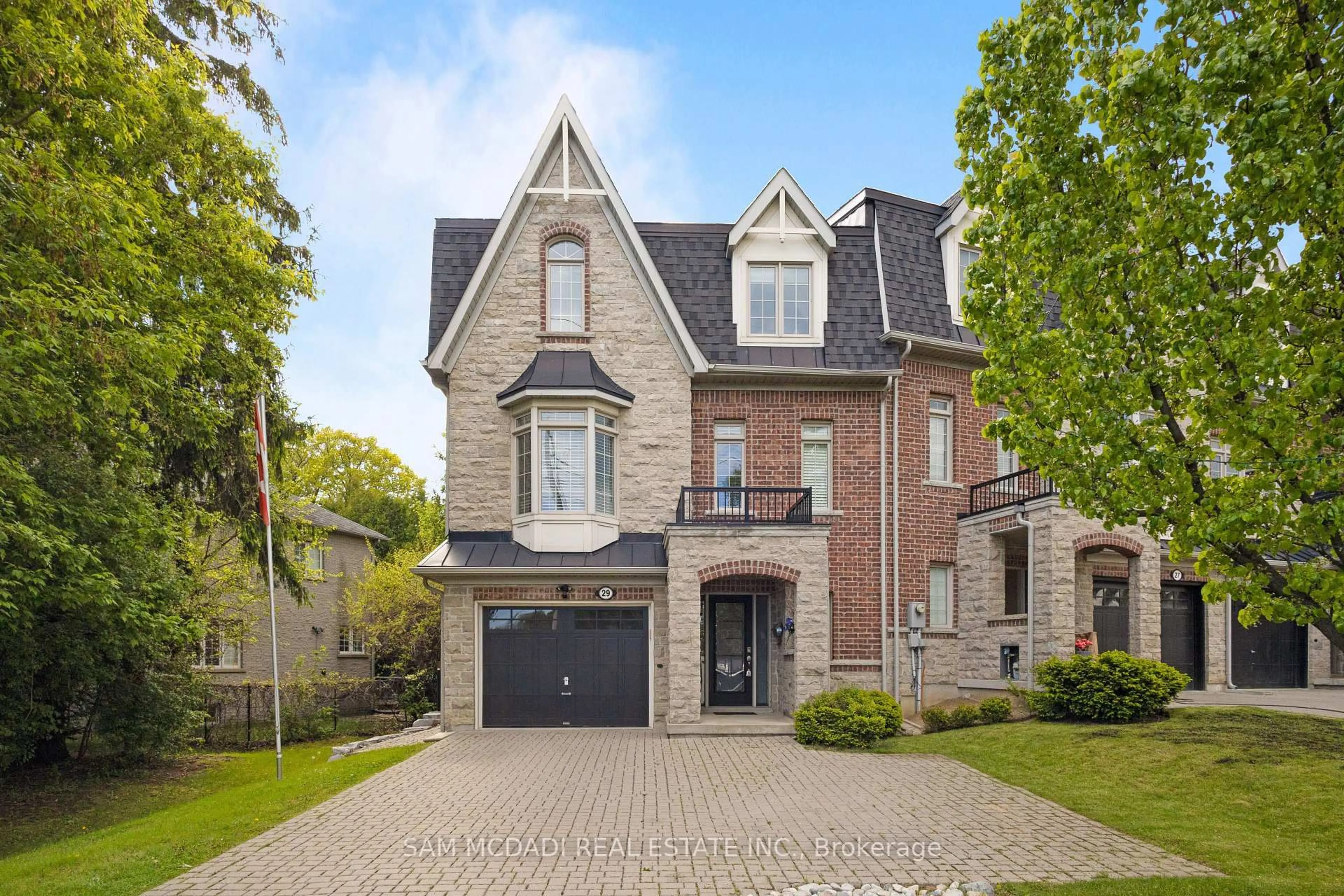 Home with brick exterior material, street for 29 Premium Way, Mississauga Ontario L5B 1A1