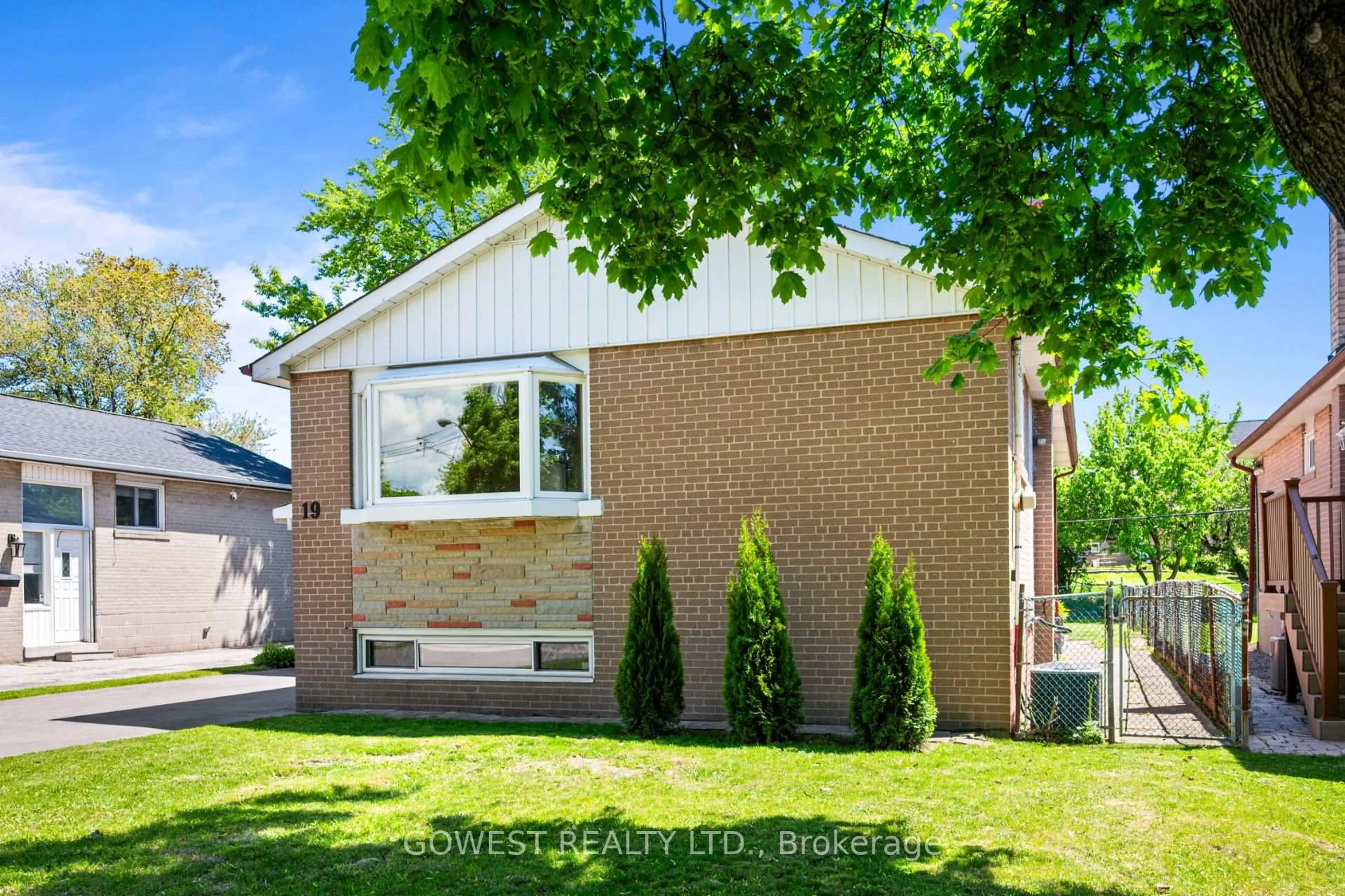 Home with brick exterior material, street for 19 Wellesworth Dr, Toronto Ontario M9C 4P5