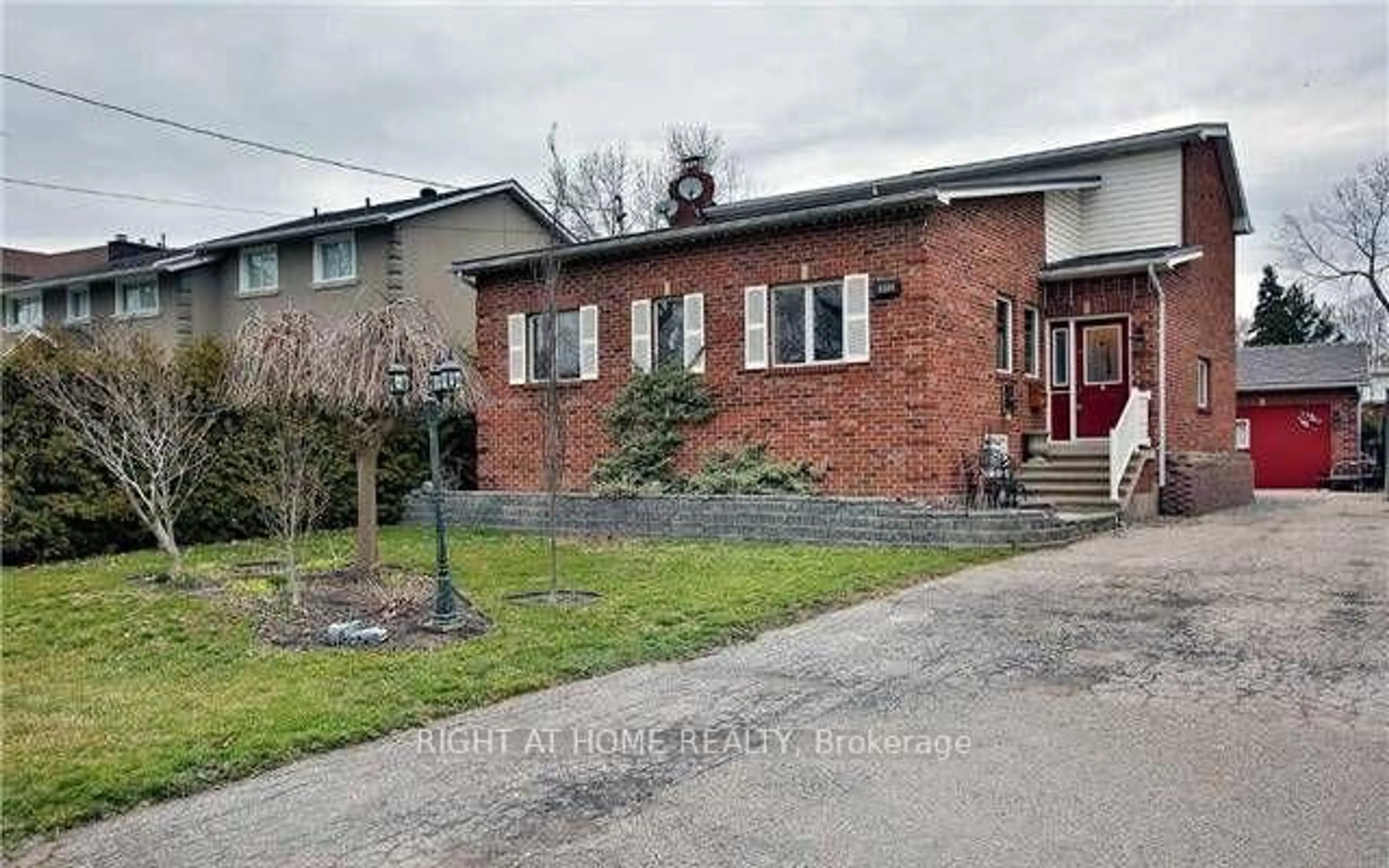Home with brick exterior material, street for 1241 Lakebreeze Dr, Mississauga Ontario L5G 3W7
