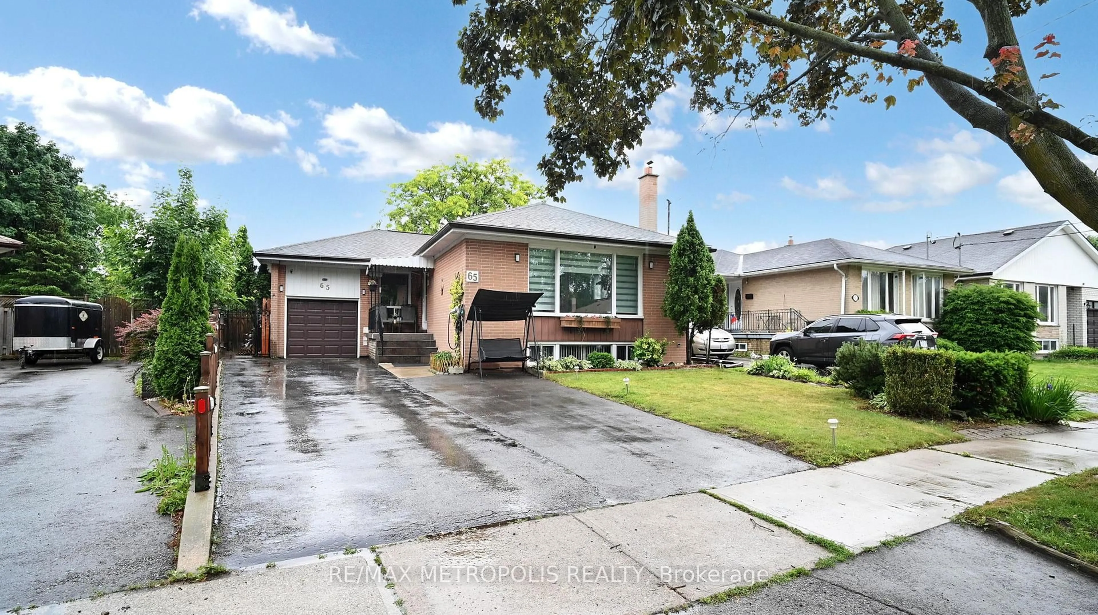 Home with brick exterior material, street for 65 Alhart Dr, Toronto Ontario M9V 2N1