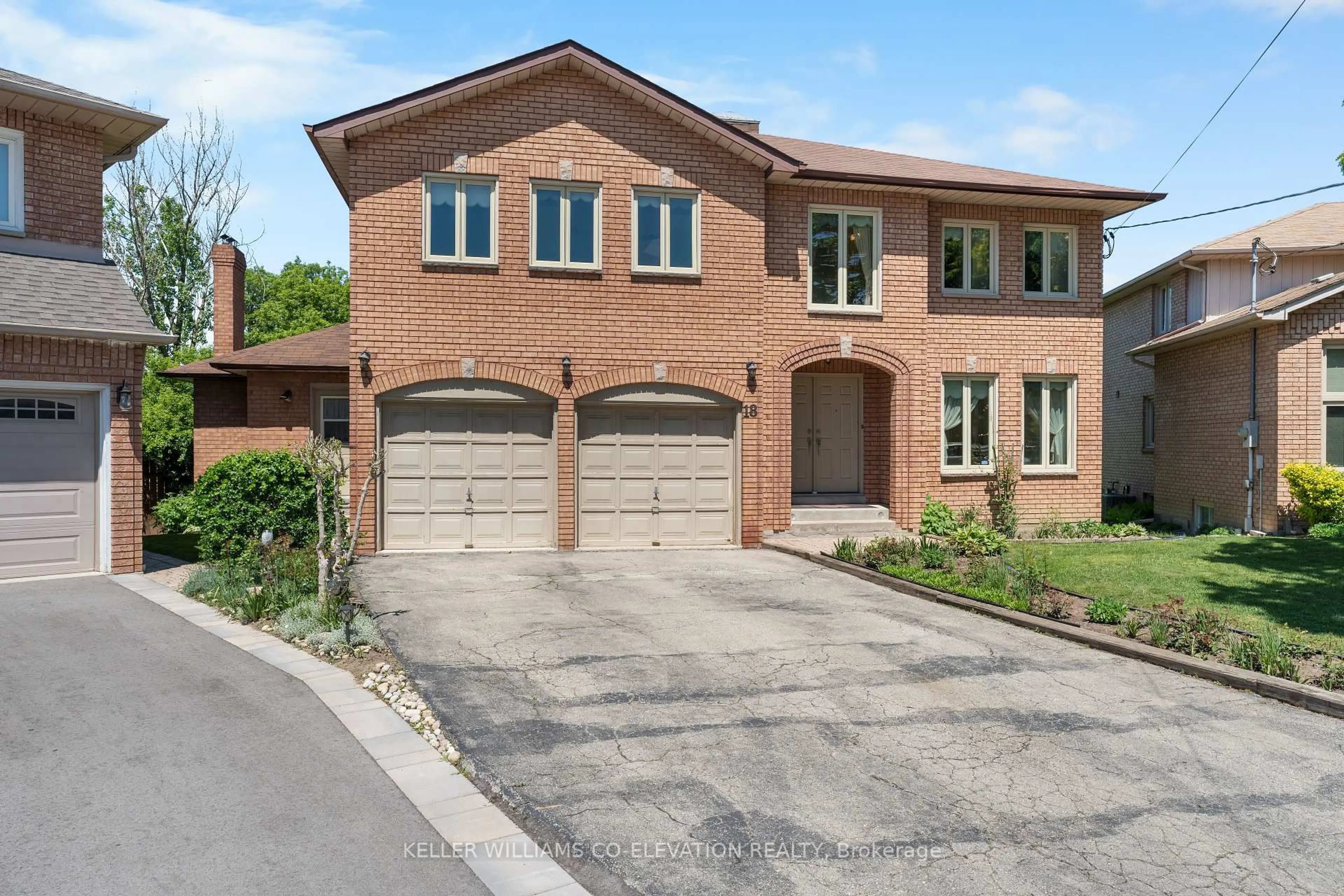 Home with brick exterior material, street for 18 Norris Pl, Toronto Ontario M9M 1K6