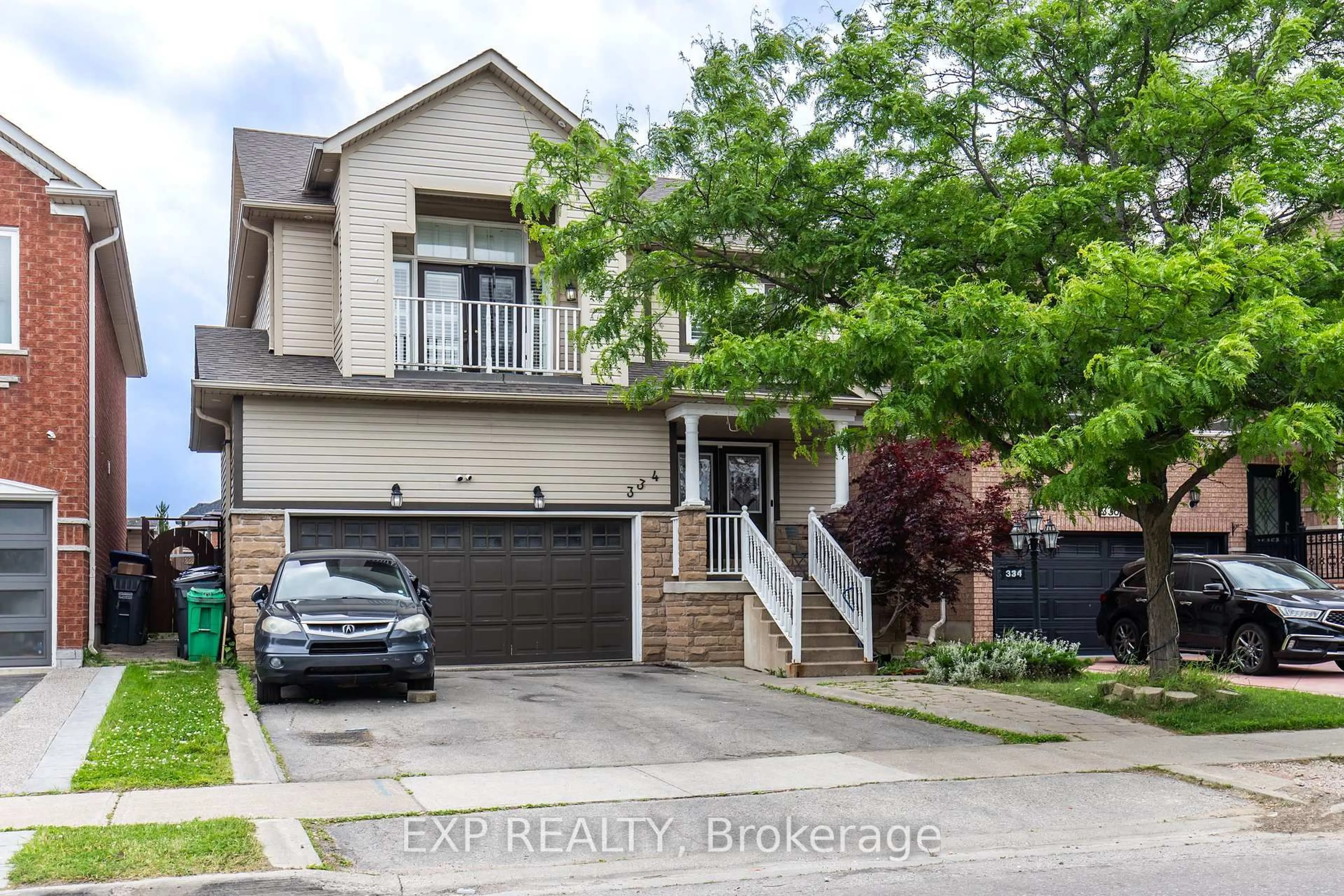 Home with brick exterior material, street for 334 Van Kirk Dr, Brampton Ontario L7A 1V5
