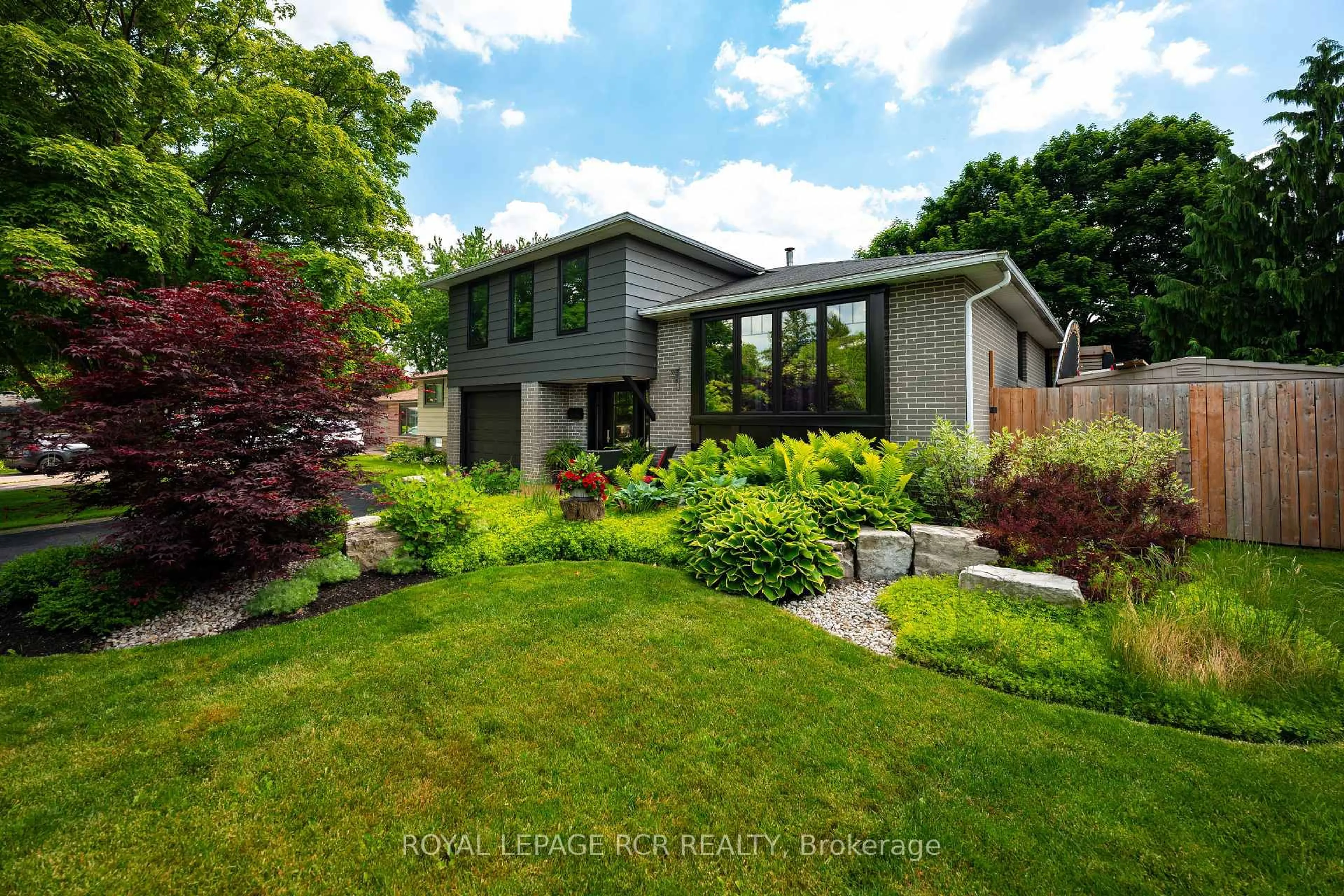 Home with brick exterior material, street for 55 Rustic Cres, Orangeville Ontario L9W 1T1