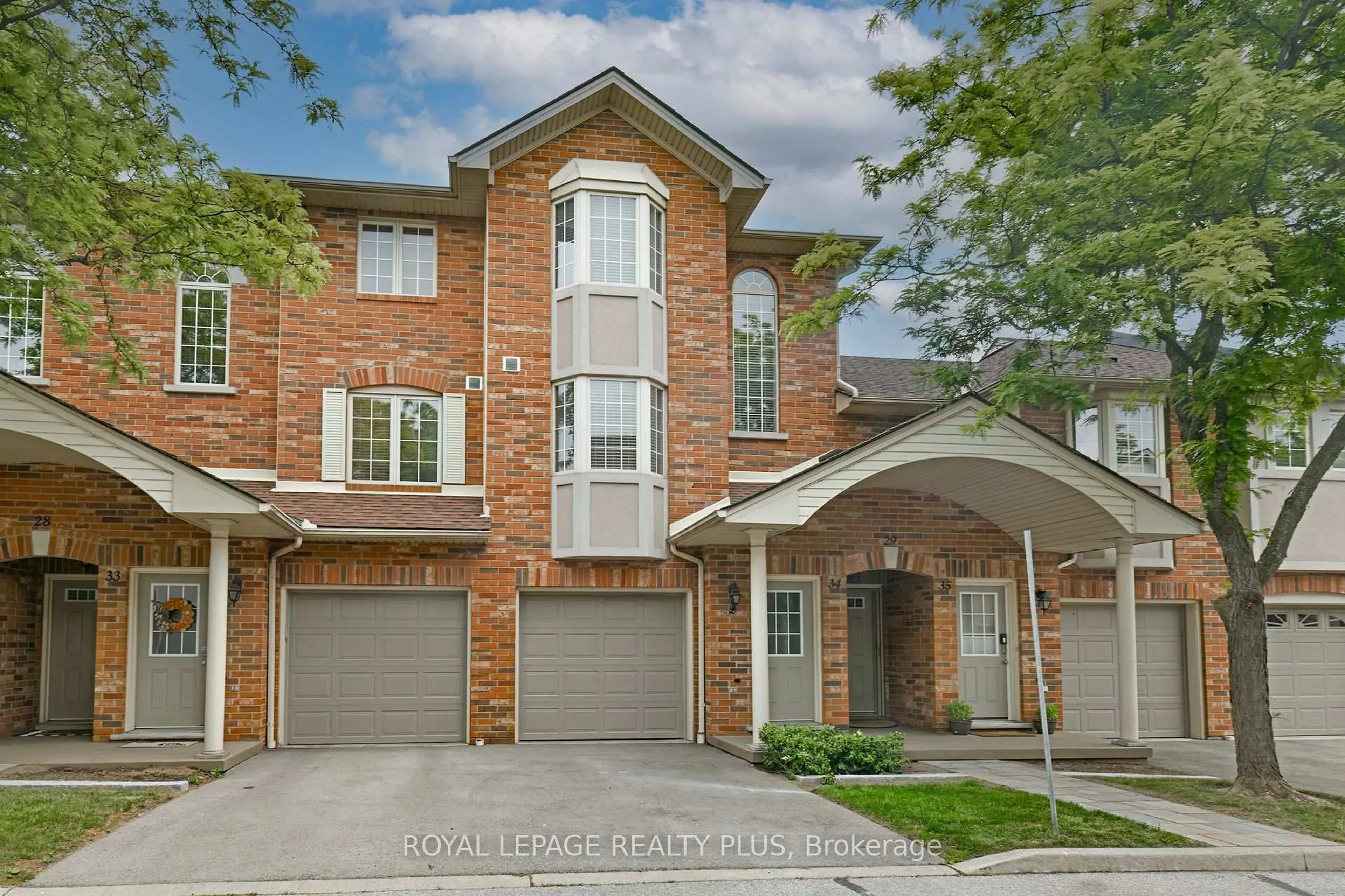Home with brick exterior material, street for 4045 Upper Middle Rd #34, Burlington Ontario L7M 4S9