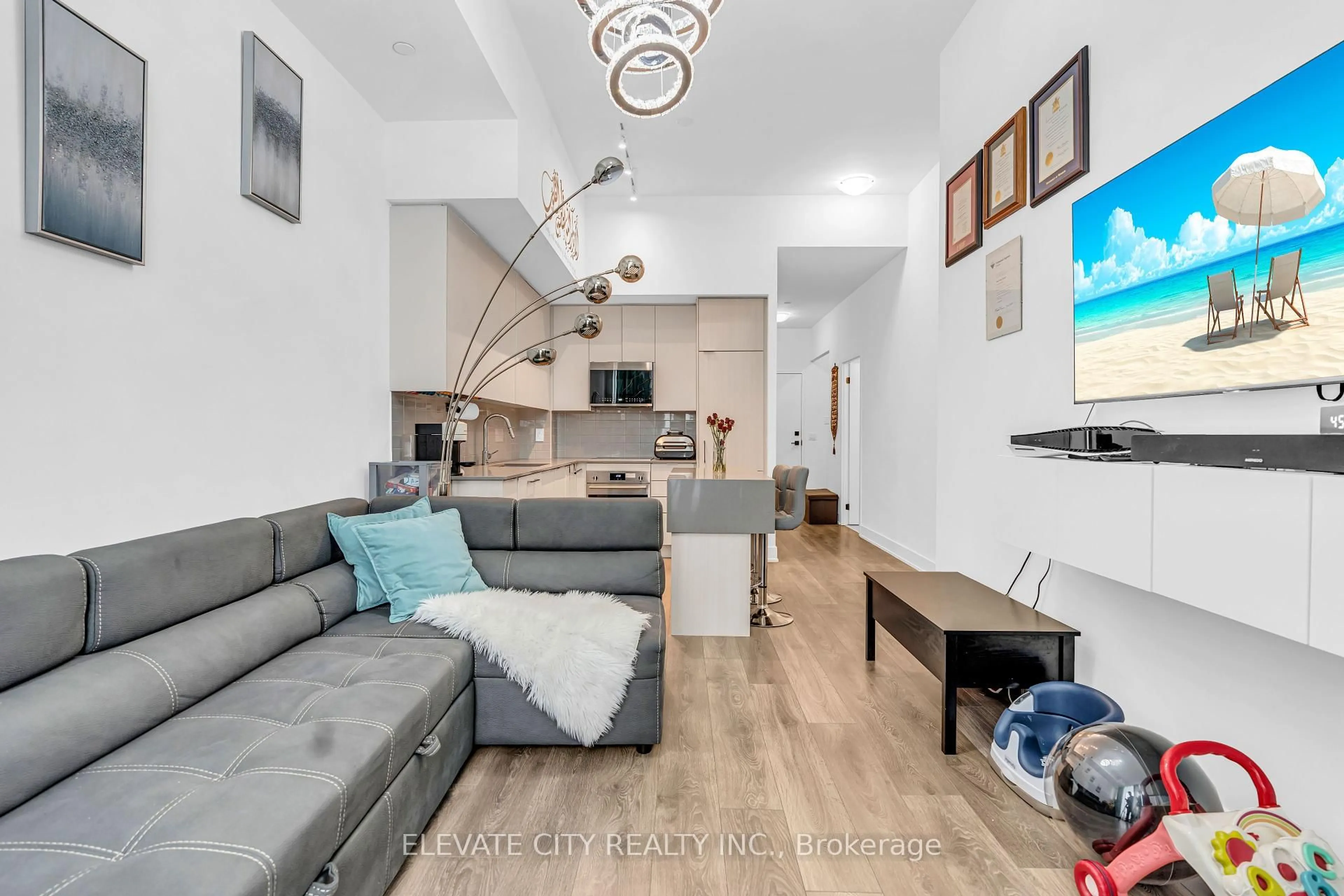 Living room with furniture, unknown for 2489 Taunton Rd #219, Oakville Ontario L6H 3R9